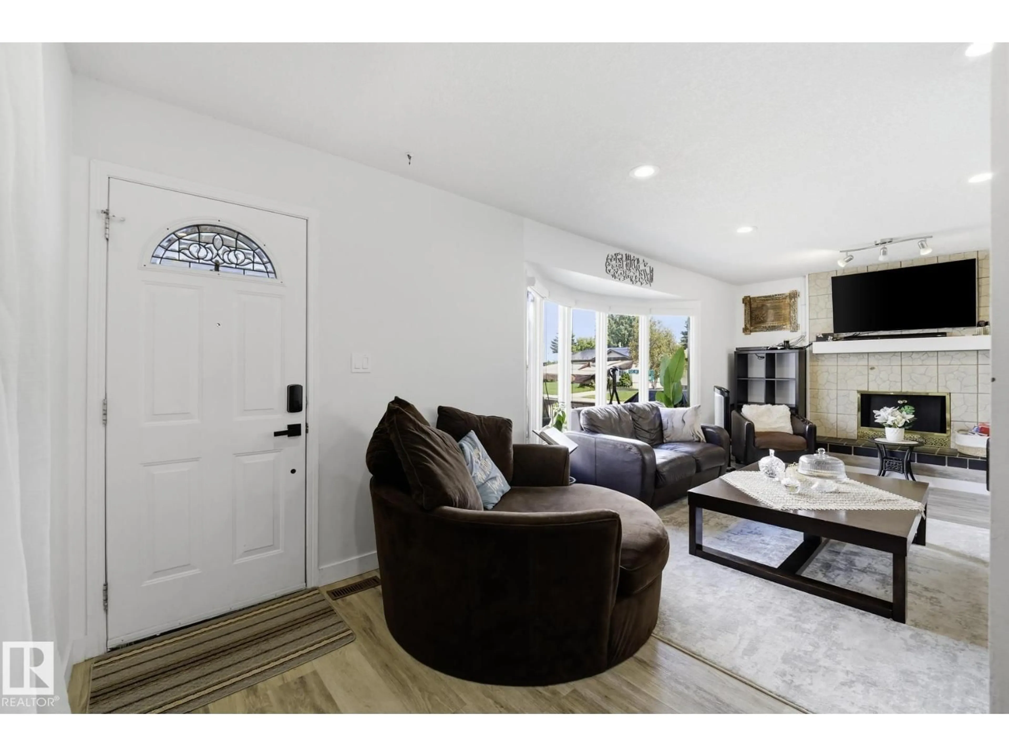 Living room with furniture, unknown for NW - 12303 152C AV, Edmonton Alberta T5X1Z1