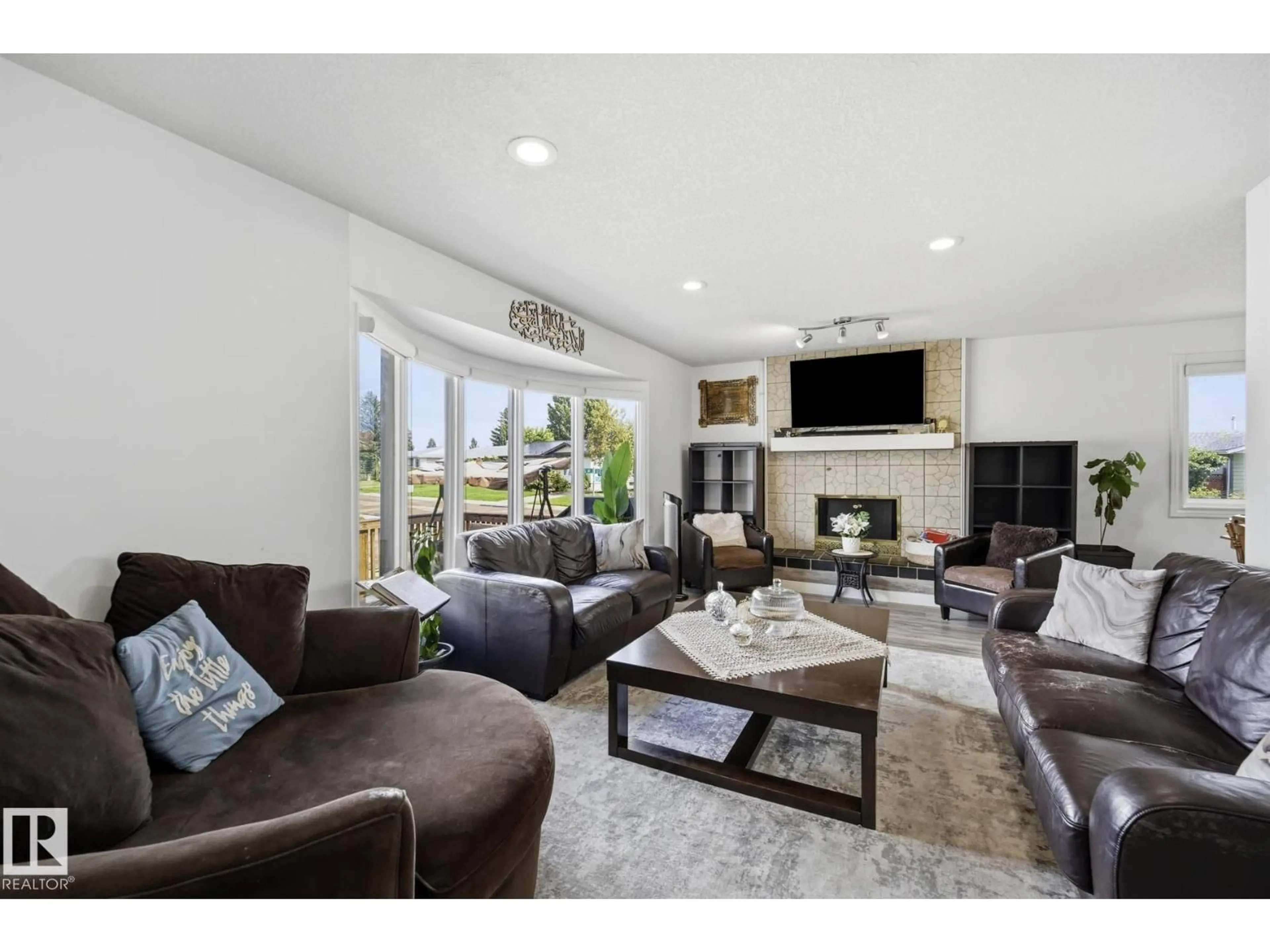Living room with furniture, unknown for NW - 12303 152C AV, Edmonton Alberta T5X1Z1