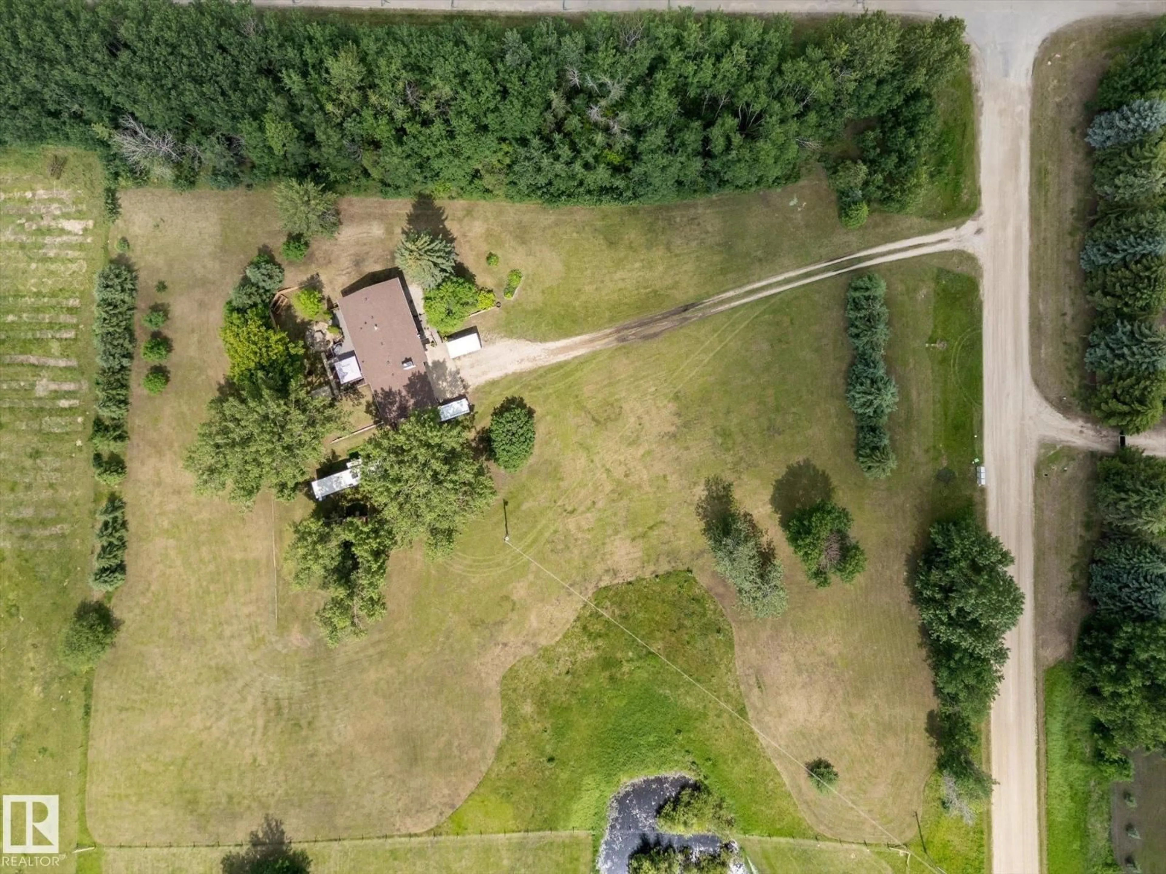A pic from outside/outdoor area/front of a property/back of a property/a pic from drone, unknown for #2 - 1511 PARKLAND DR, Rural Parkland County Alberta T7Y2T6