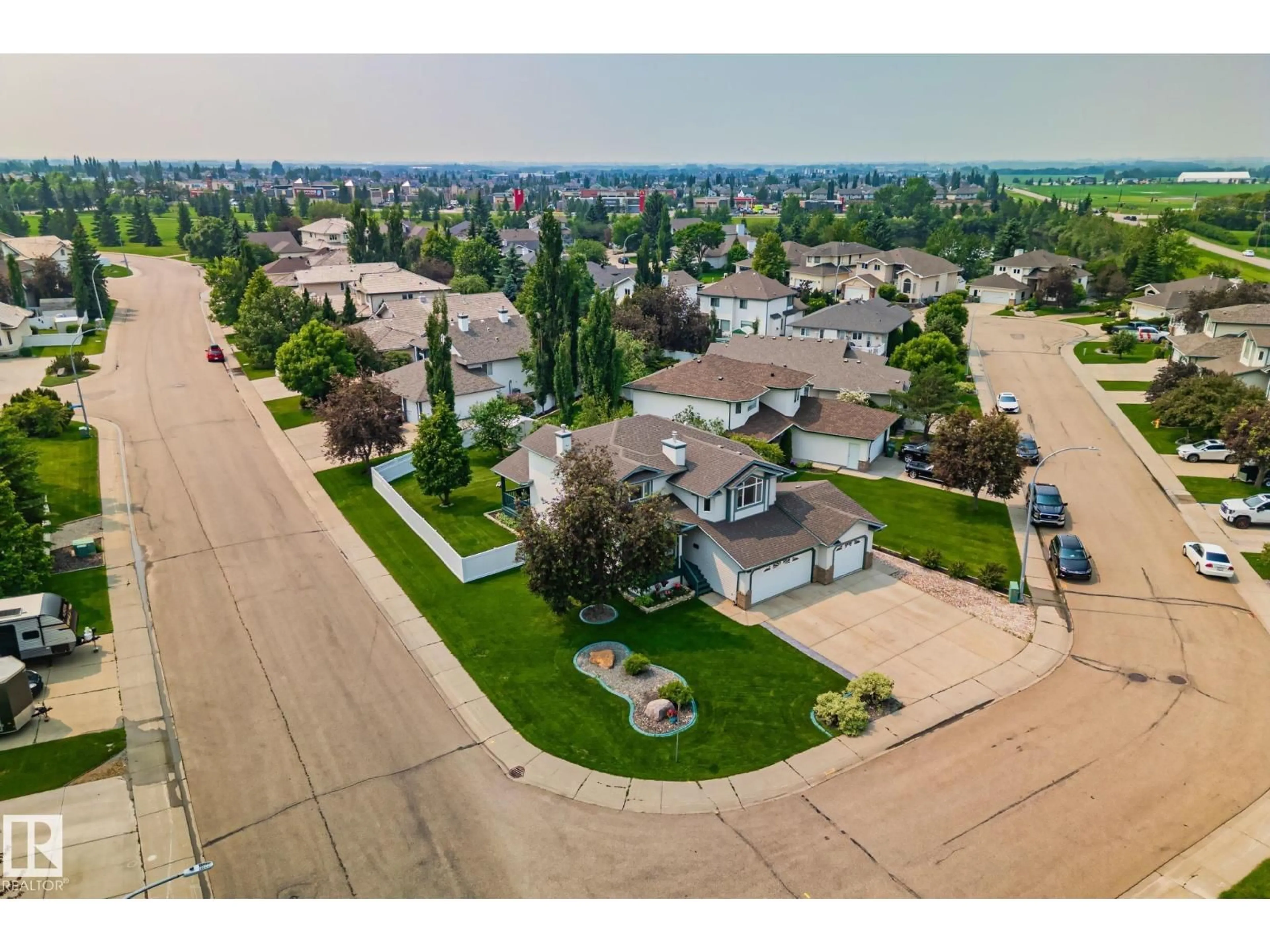 A pic from outside/outdoor area/front of a property/back of a property/a pic from drone, street for 38 RIVARD CR, Beaumont Alberta T4X1L6