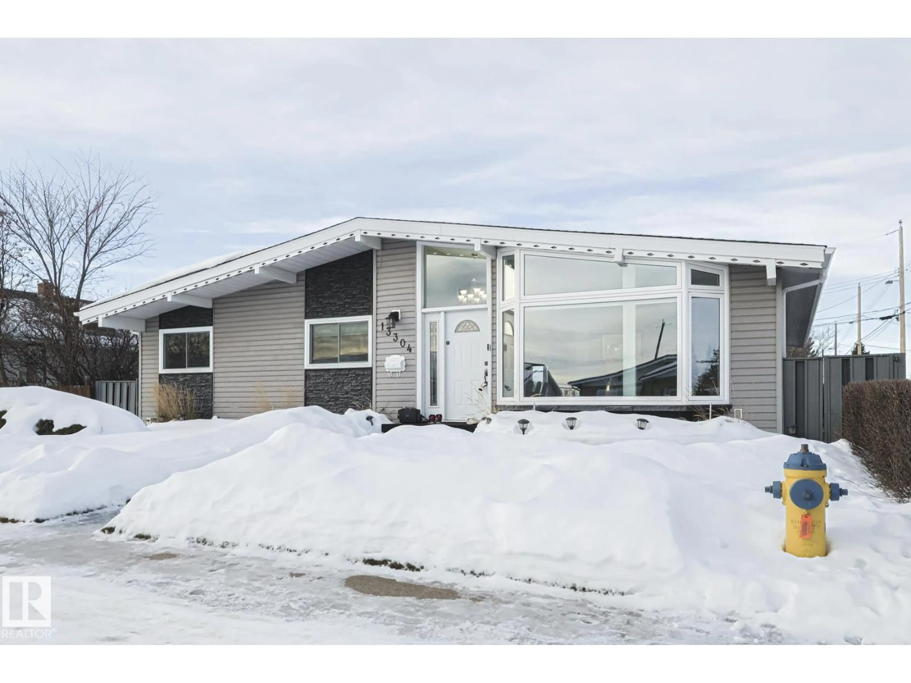 Home with vinyl exterior material, street for NW - 13304 70 ST, Edmonton Alberta T5C0K3