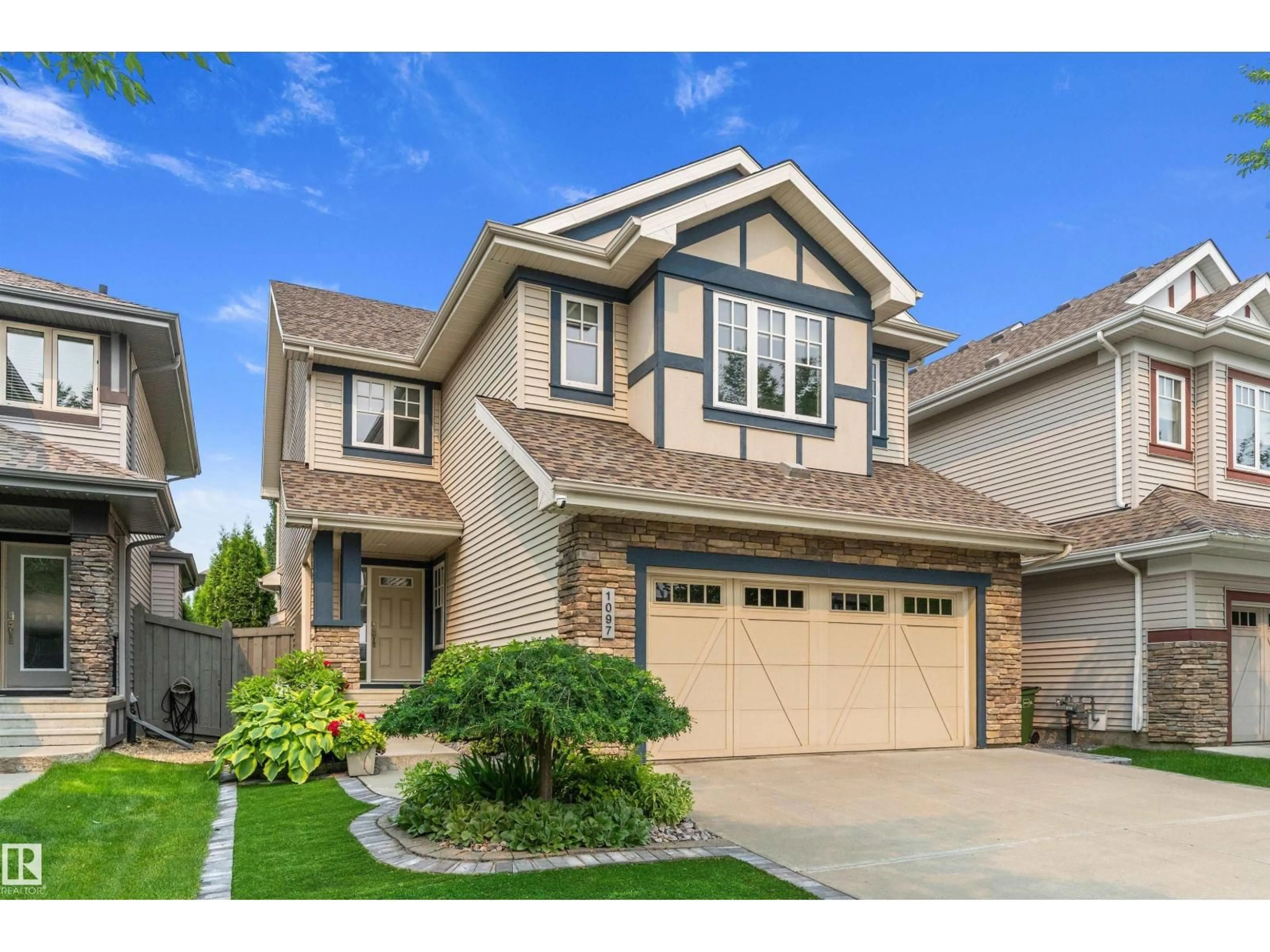 Home with vinyl exterior material, street for SW - 1097 ARMITAGE CR, Edmonton Alberta T6W0H2