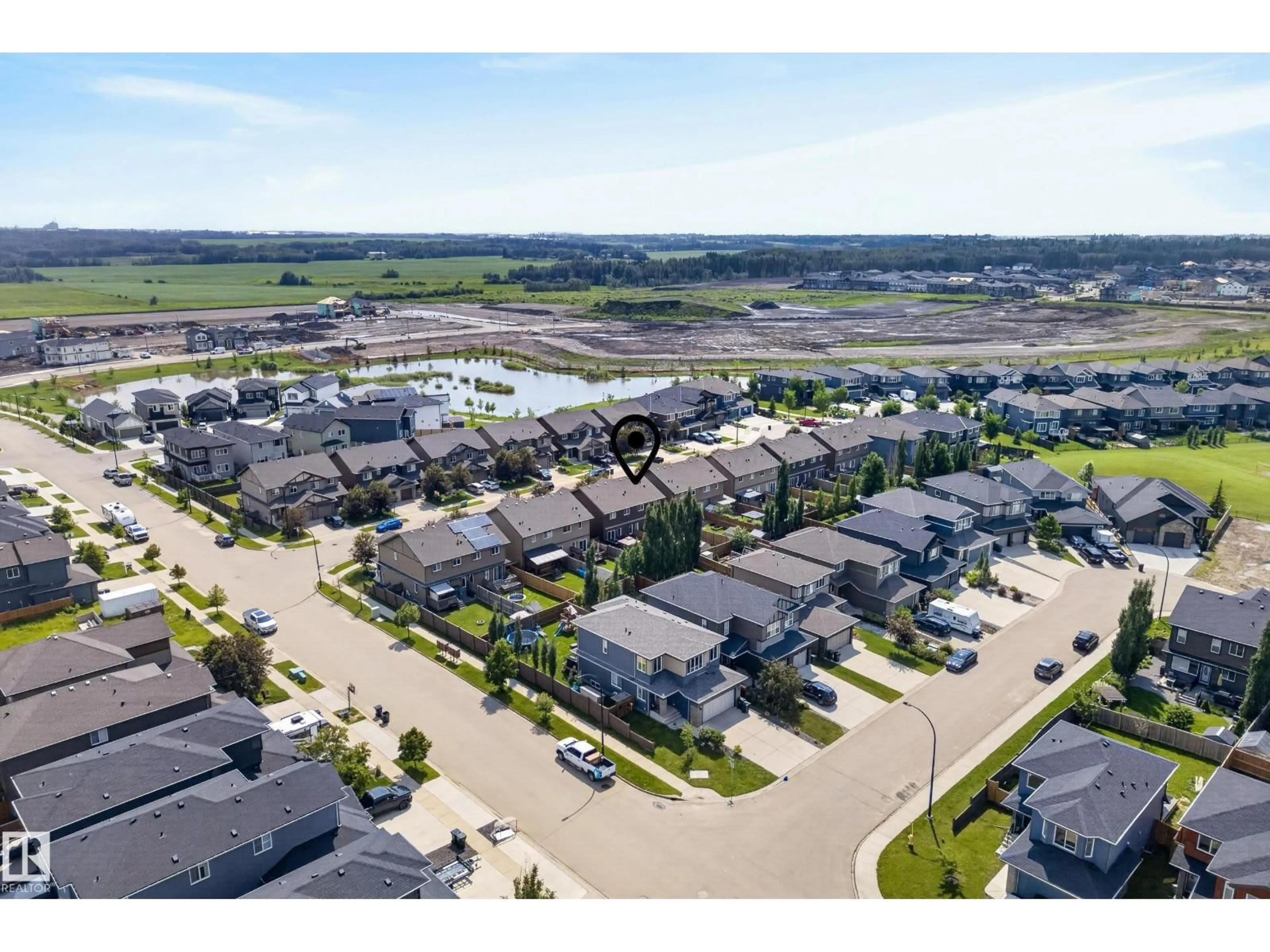 A pic from outside/outdoor area/front of a property/back of a property/a pic from drone, water/lake/river/ocean view for 11 PETER ST, Spruce Grove Alberta T7X0R4
