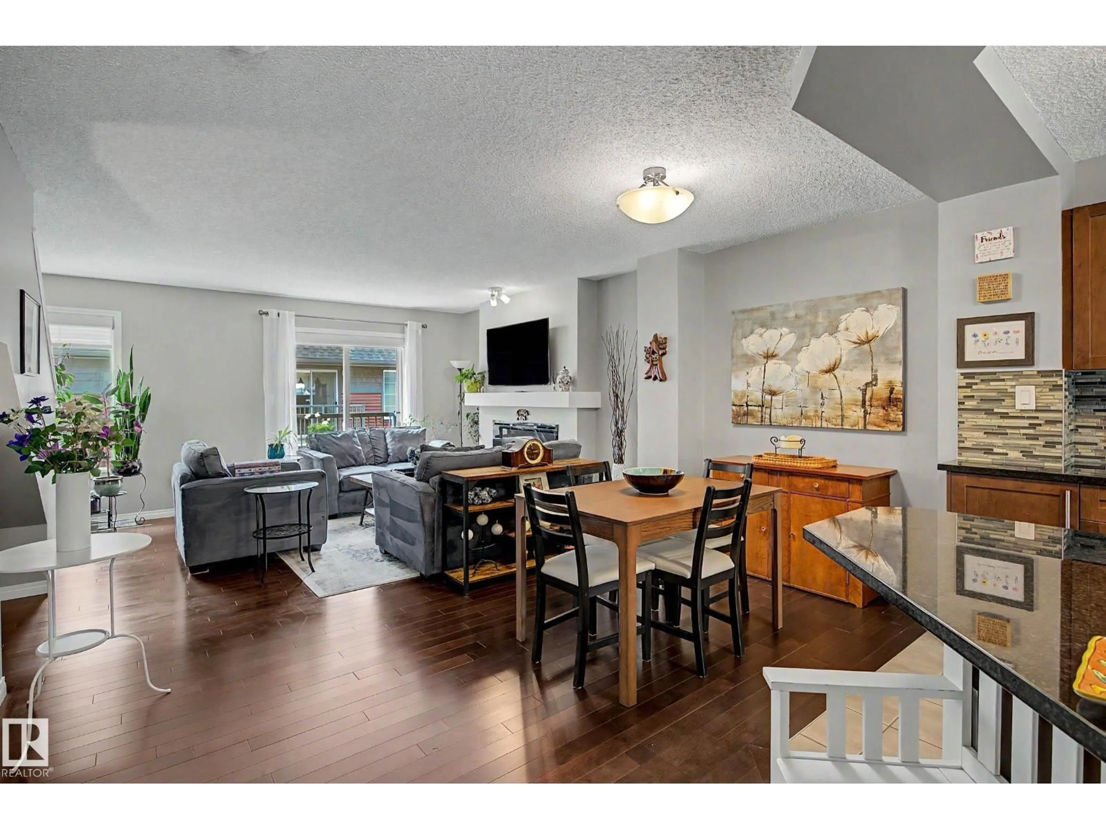 Open concept kitchen, wood/laminate floor for #35 - 4029 ORCHARDS DR, Edmonton Alberta T6X1V2