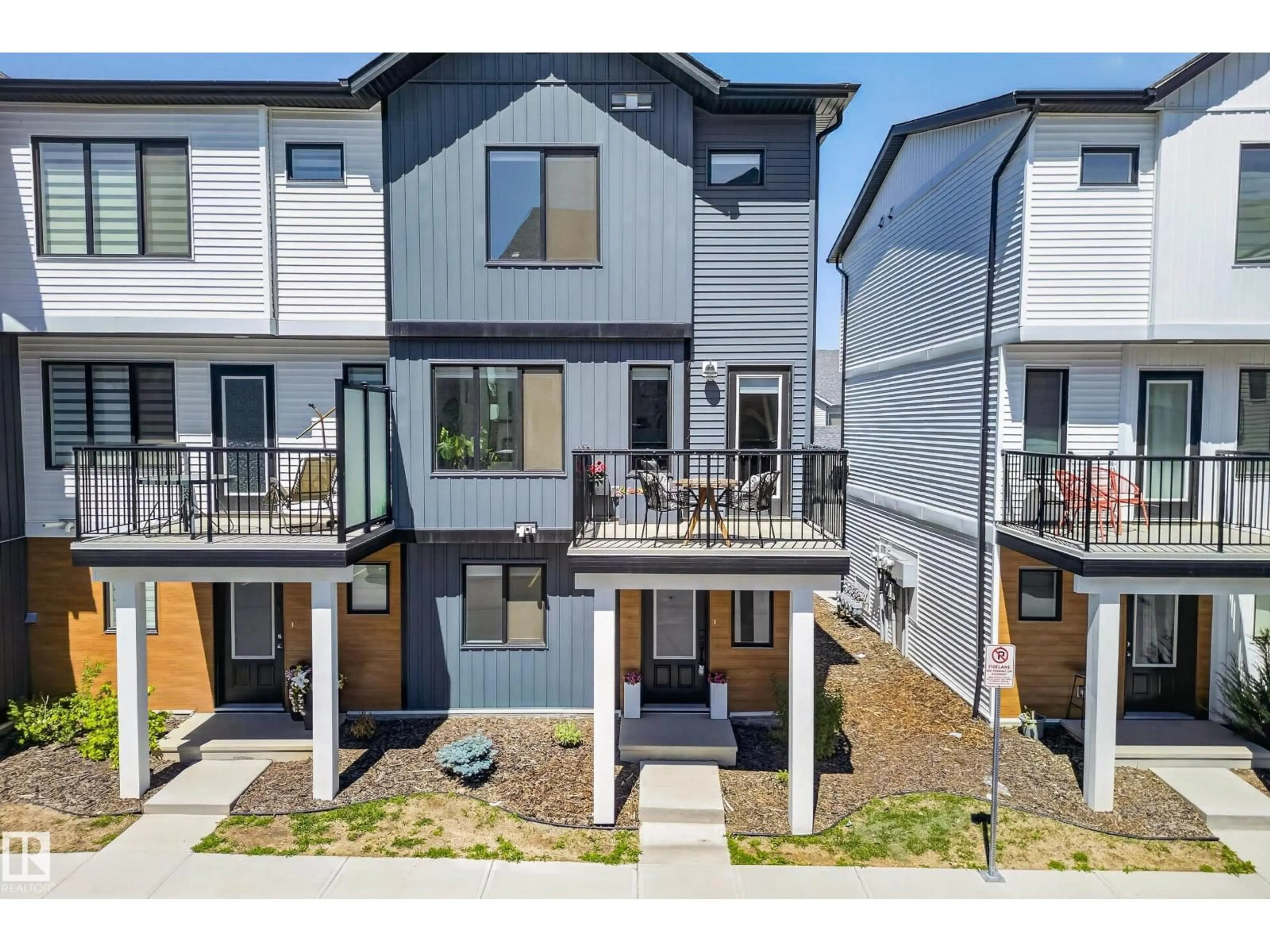 Home with vinyl exterior material, street for 13 - 850 SECORD BV, Edmonton Alberta T5T1K8