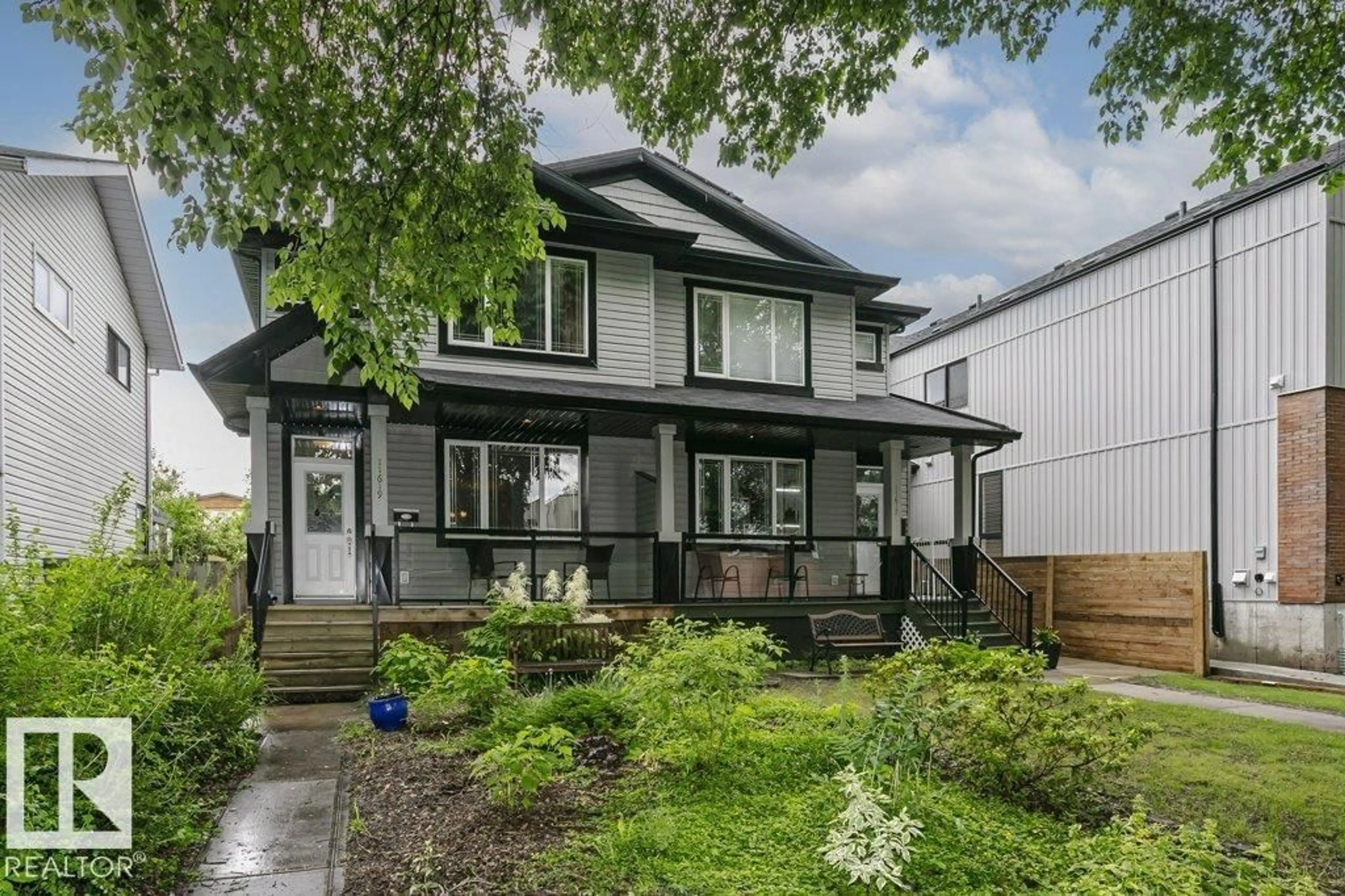 Home with vinyl exterior material, street for 11619 125 ST, Edmonton Alberta T5M0N5
