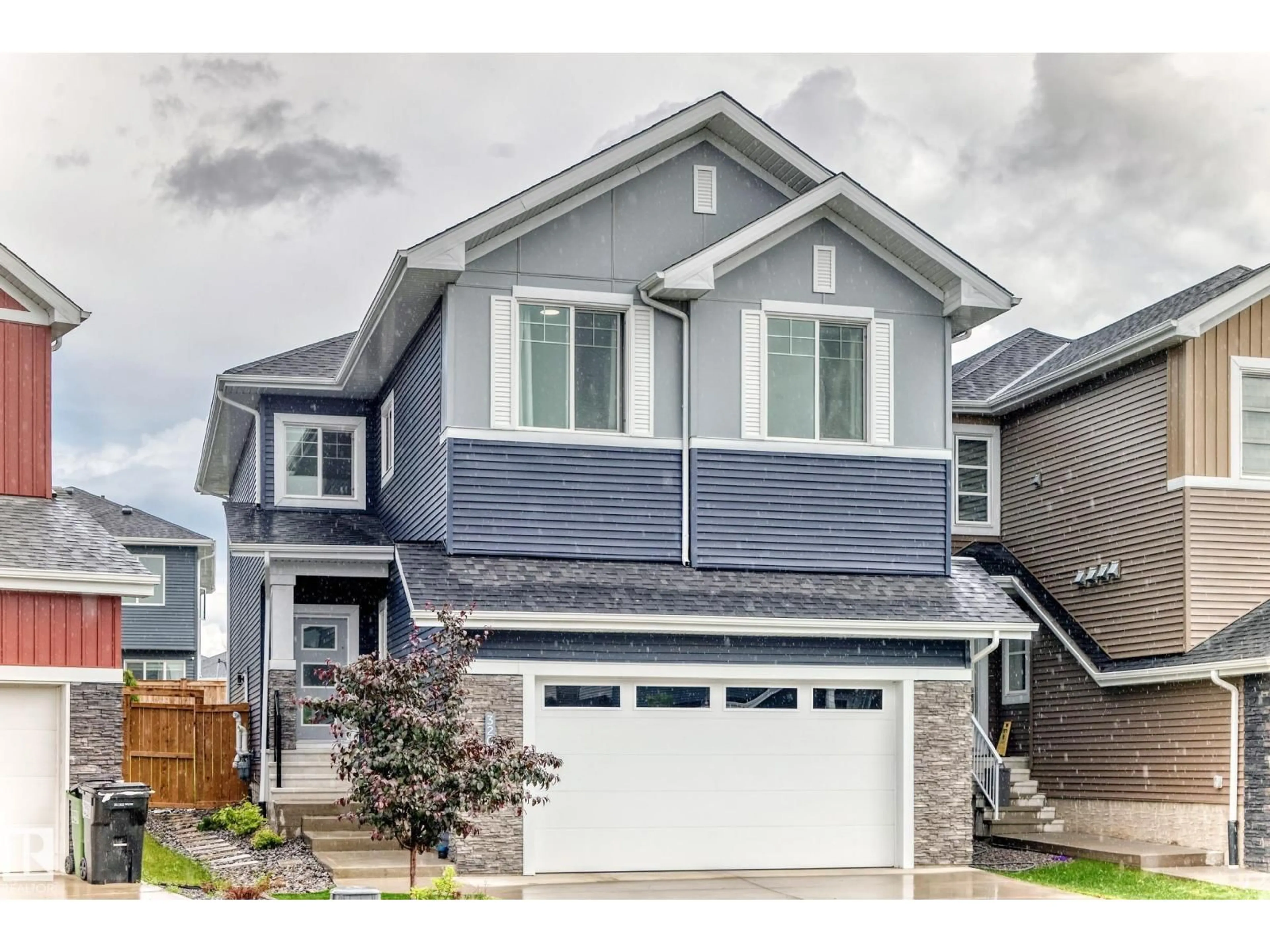 Home with vinyl exterior material, street for SW - 3207 160 ST, Edmonton Alberta T6W5A1