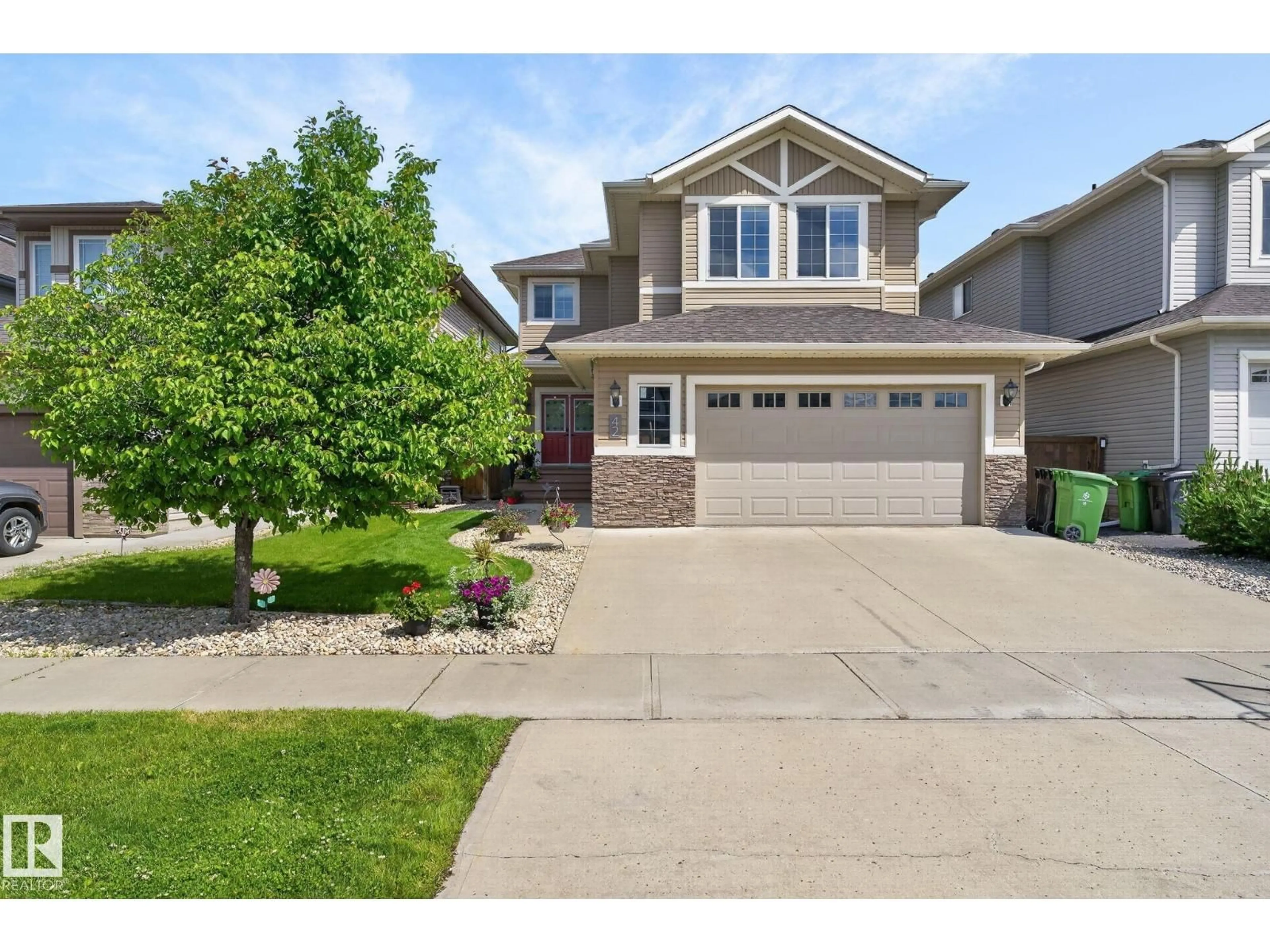 Home with vinyl exterior material, street for 42 SIENNA GA, Fort Saskatchewan Alberta T8L0J2