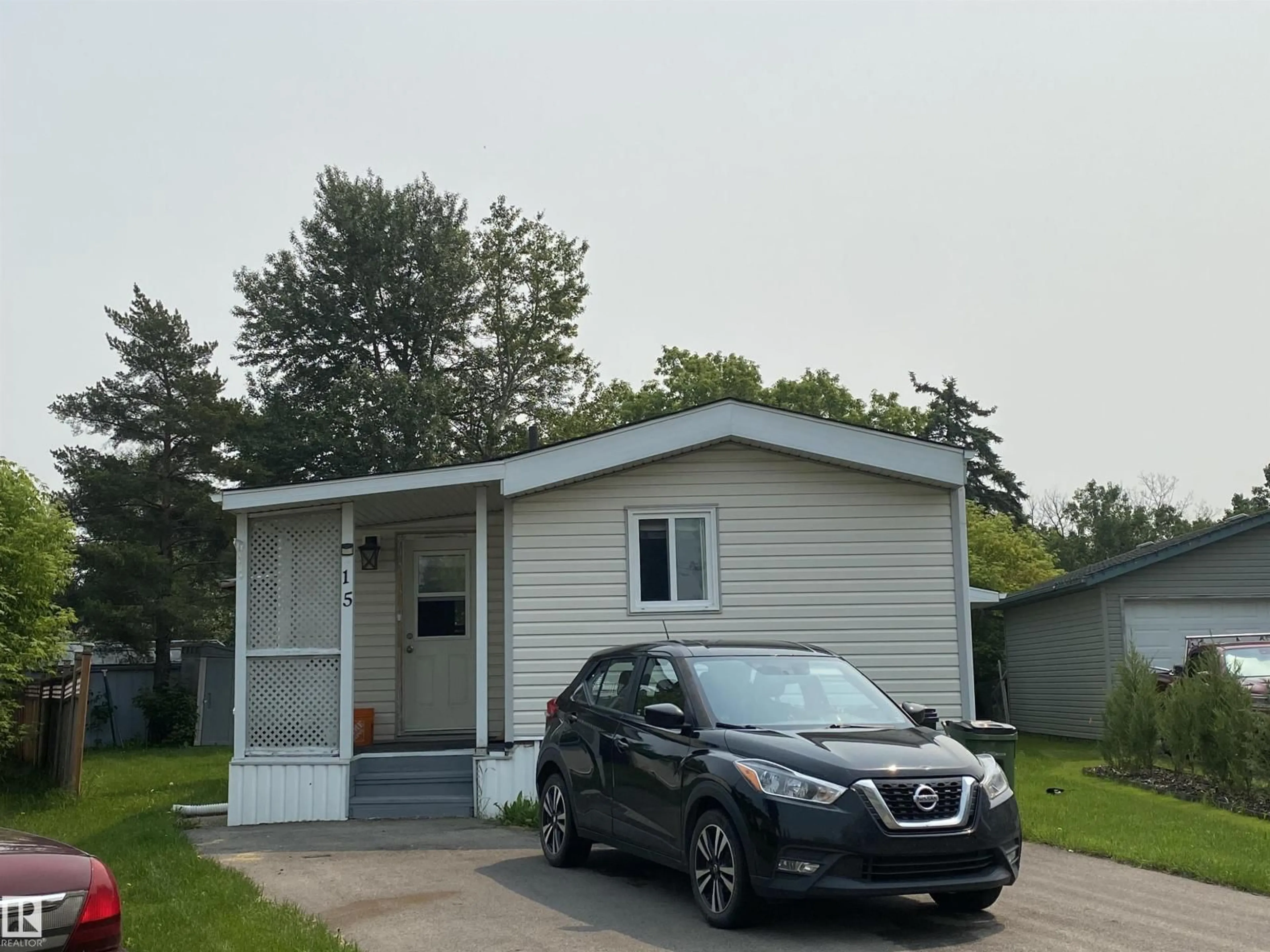 Home with vinyl exterior material, street for 15 CLIFF CR, Edmonton Alberta T6P1B6