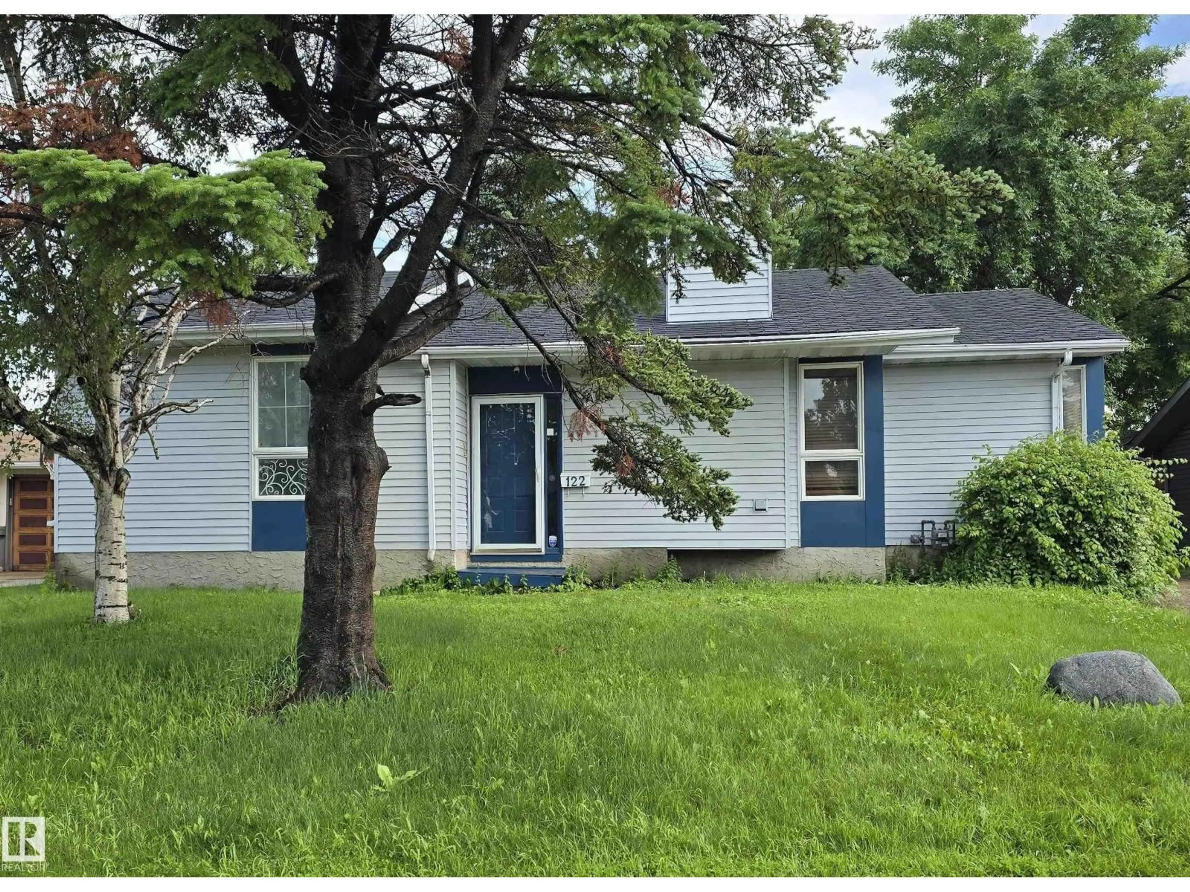 Home with vinyl exterior material, street for 122 HARRISON DR, Edmonton Alberta T5A2R4