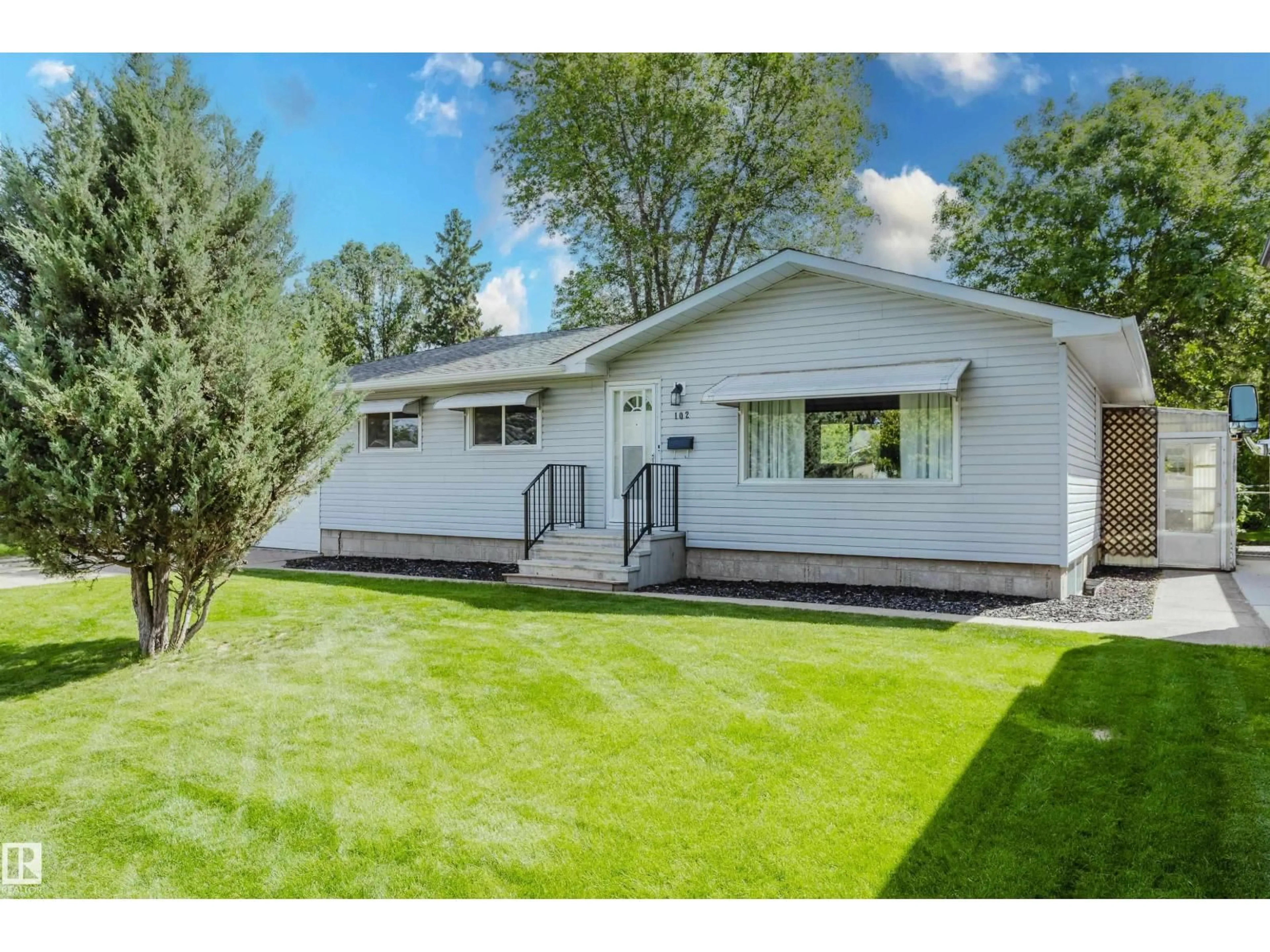 Home with vinyl exterior material, street for 102 PINE ST, Sherwood Park Alberta T8A1G8