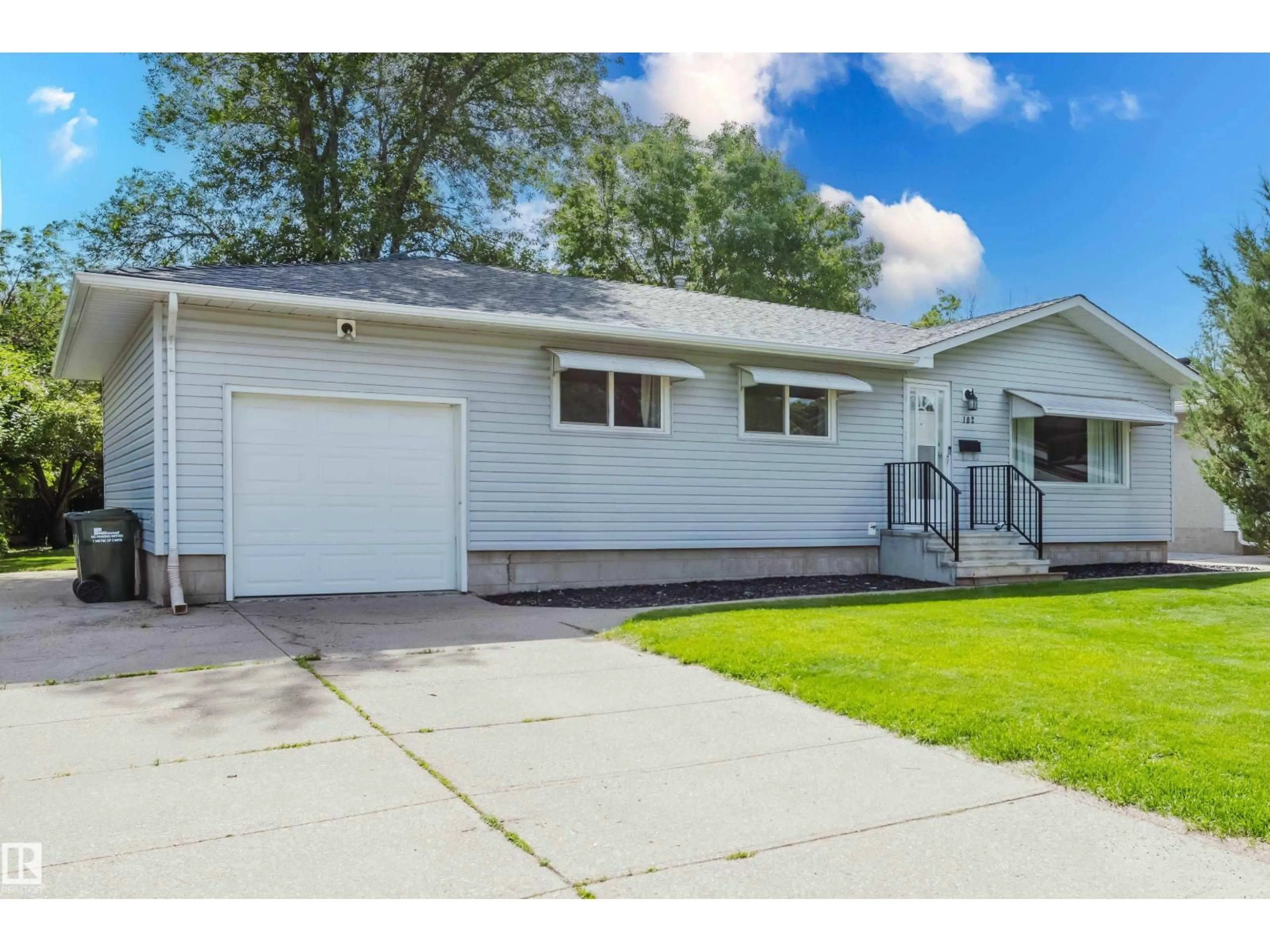 Home with vinyl exterior material, street for 102 PINE ST, Sherwood Park Alberta T8A1G8