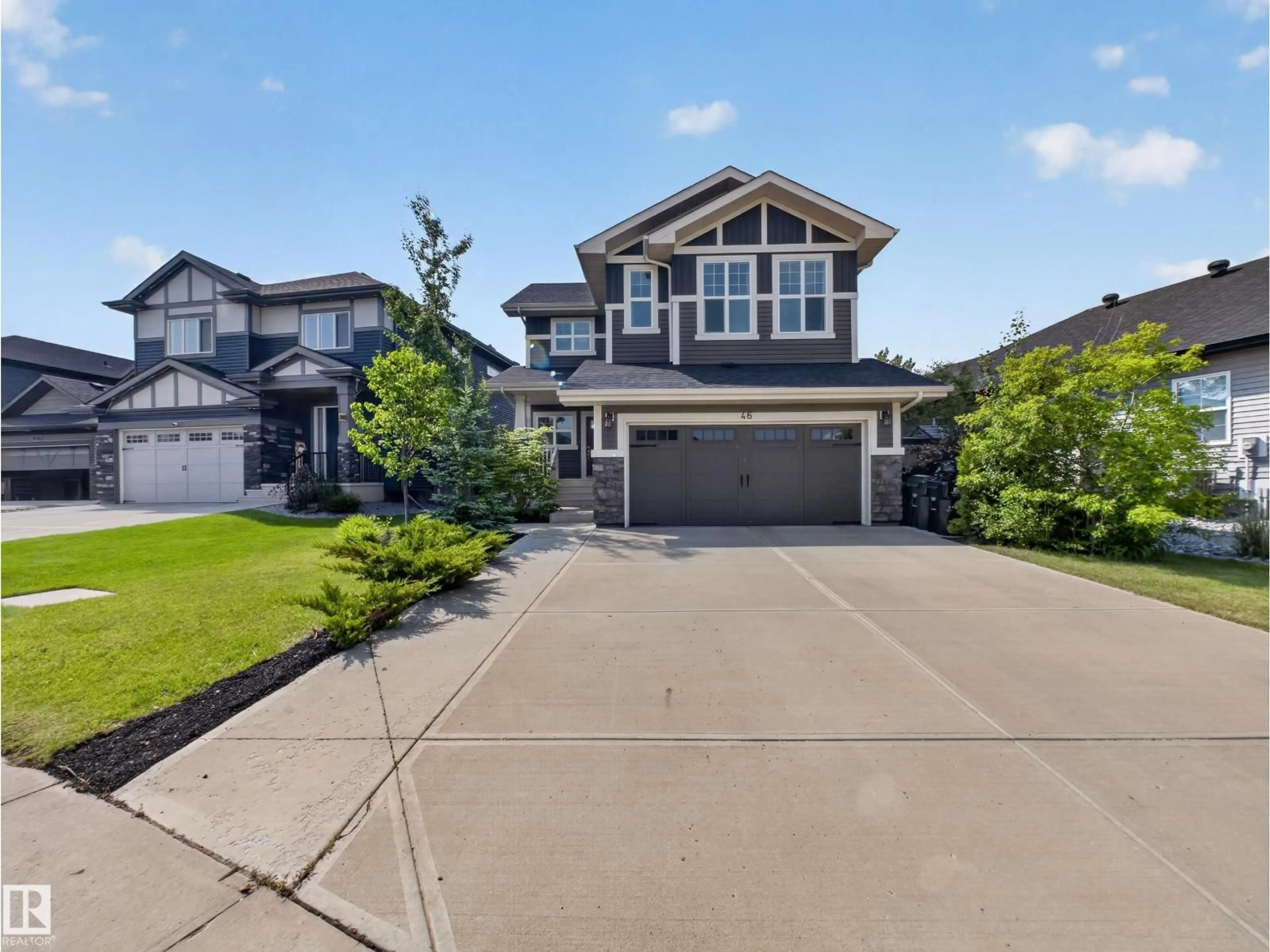 A pic from outside/outdoor area/front of a property/back of a property/a pic from drone, street for 46 AVEBURY CT, Sherwood Park Alberta T8H0Z3