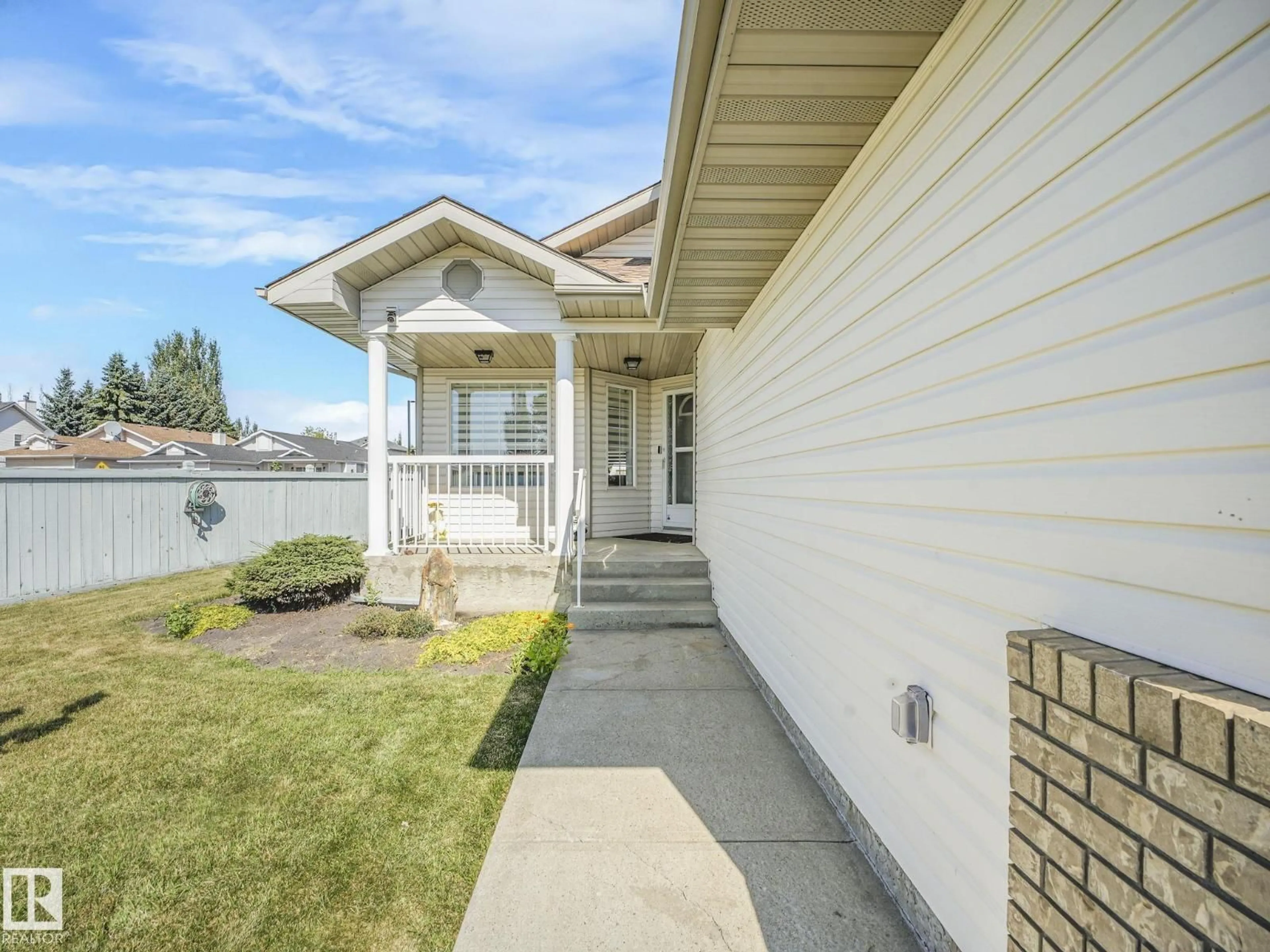 Home with vinyl exterior material, street for NW - 10336 178 AV, Edmonton Alberta T5X5Y6