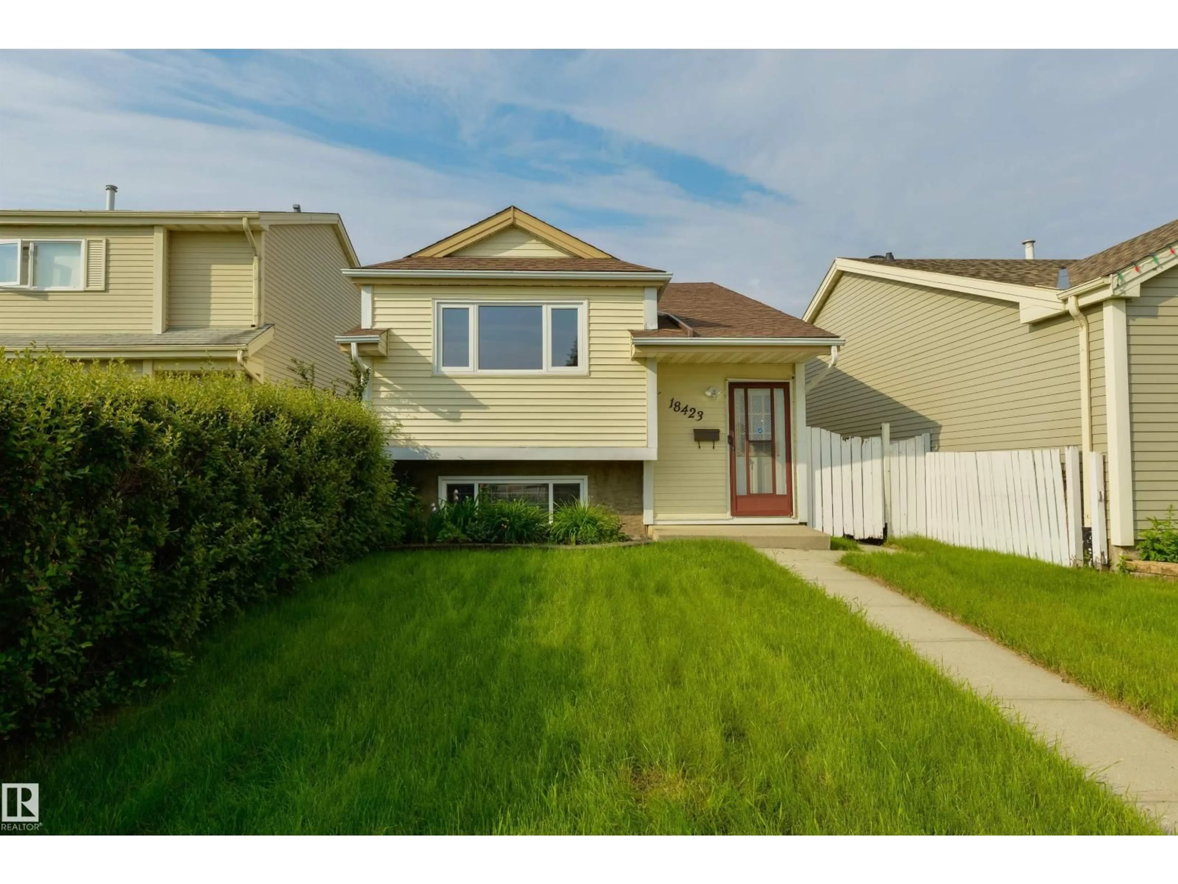 Home with vinyl exterior material, street for 18423 96A AV, Edmonton Alberta T5T3N8