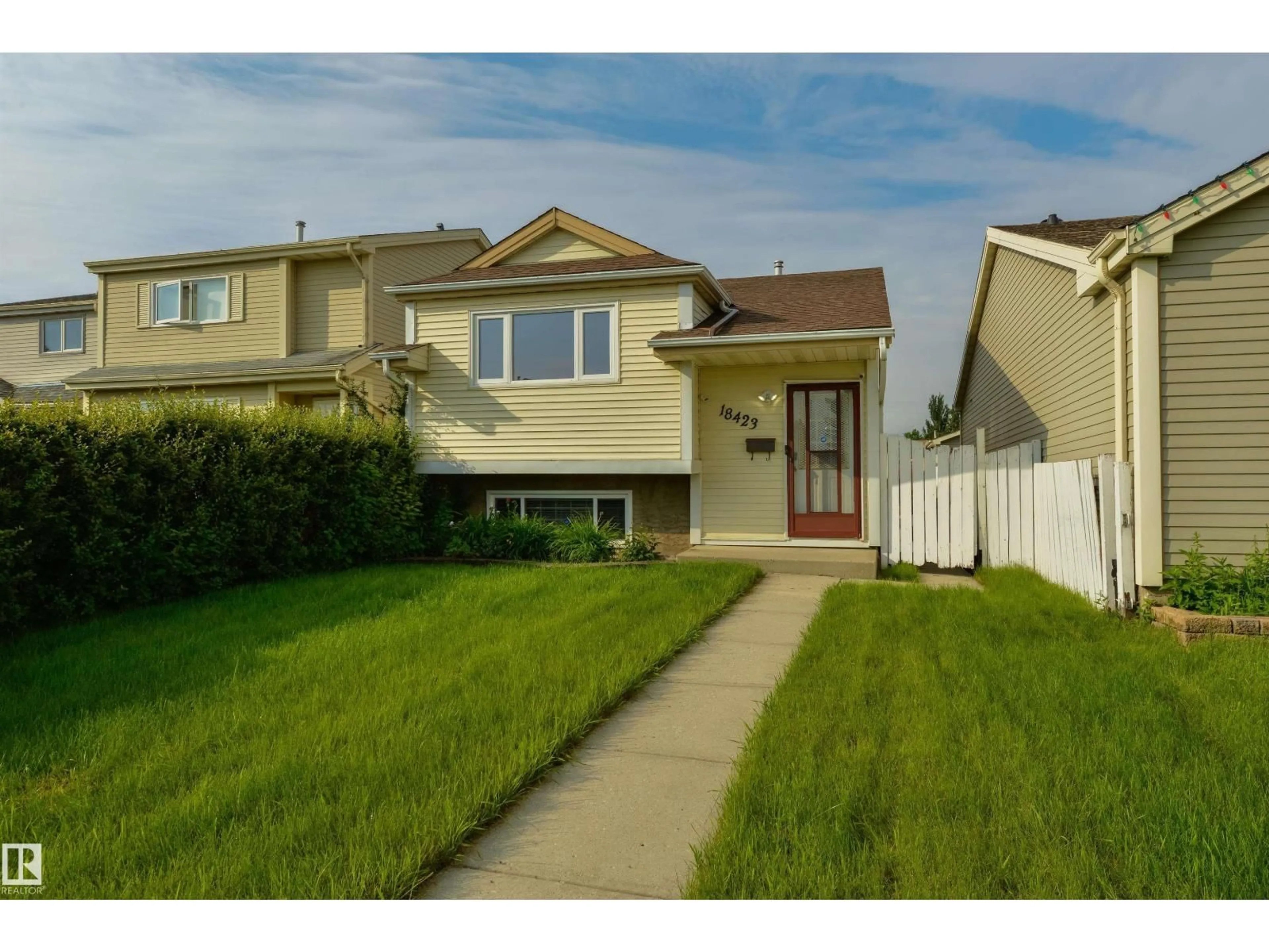 Home with vinyl exterior material, street for 18423 96A AV, Edmonton Alberta T5T3N8
