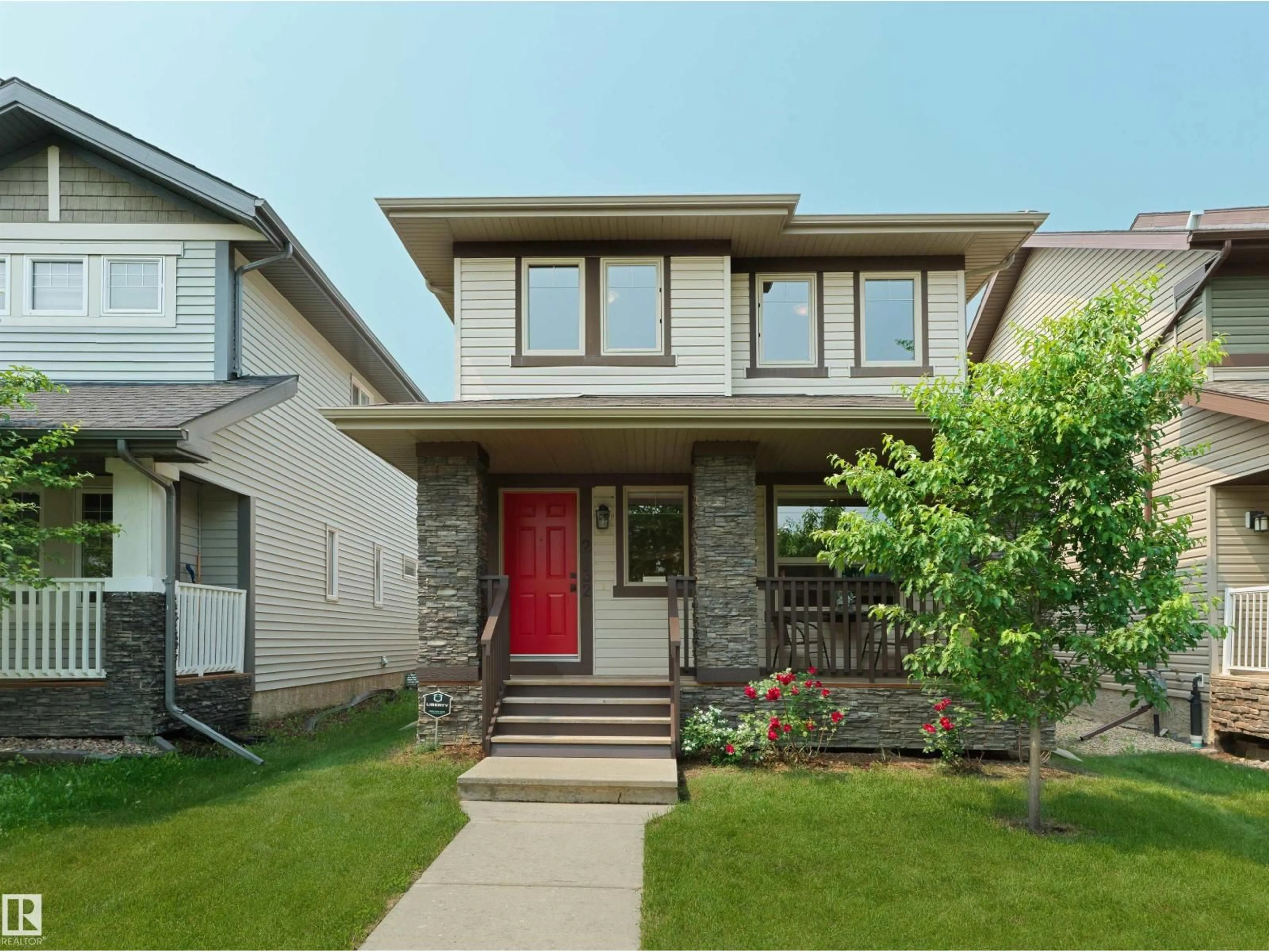 Home with vinyl exterior material, street for 2132 GLENRIDDING WY, Edmonton Alberta T6W2H4