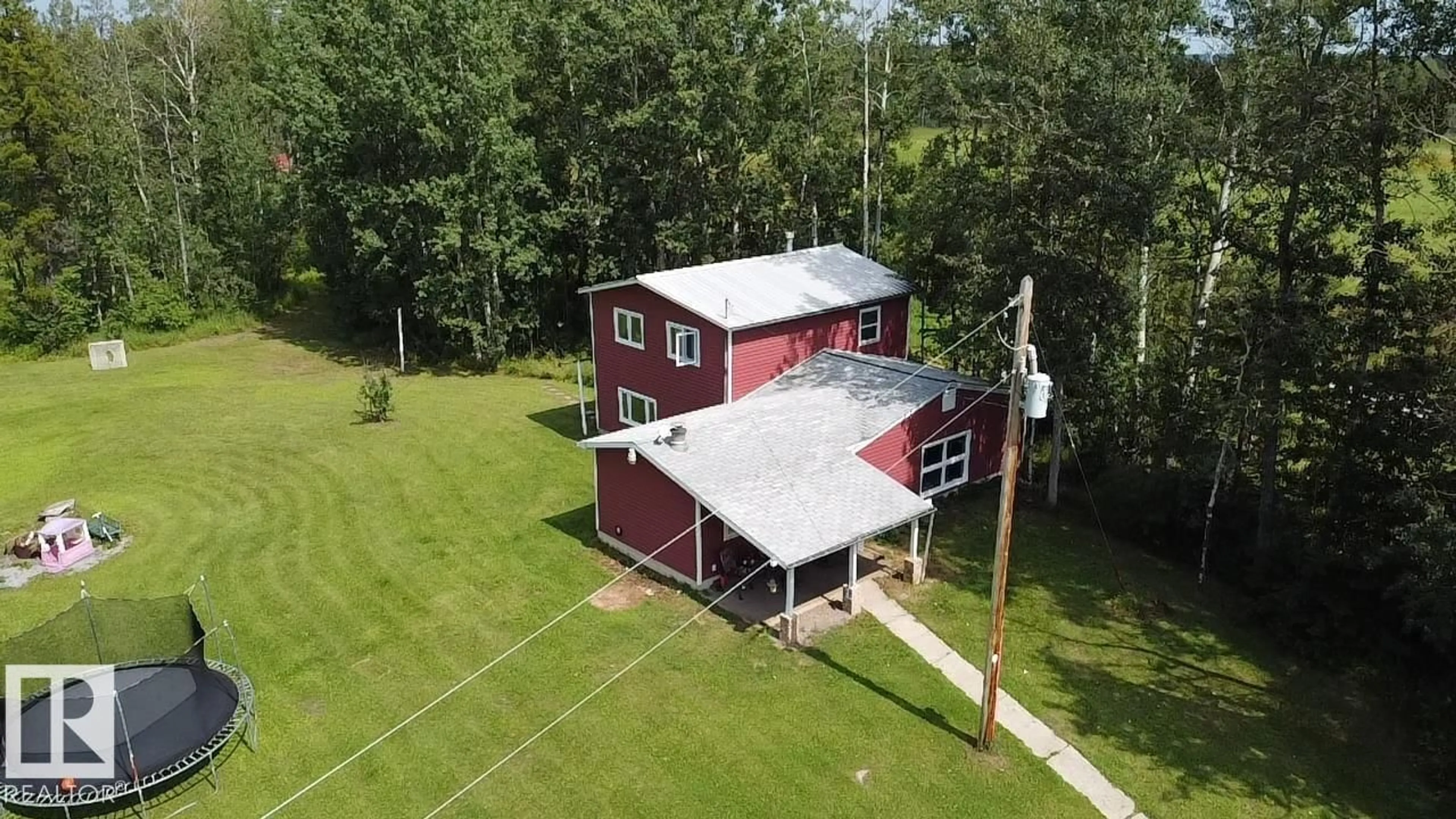 A pic from outside/outdoor area/front of a property/back of a property/a pic from drone, building for 470047 RGE ROAD 35, Rural Wetaskiwin County Alberta T0C2X0