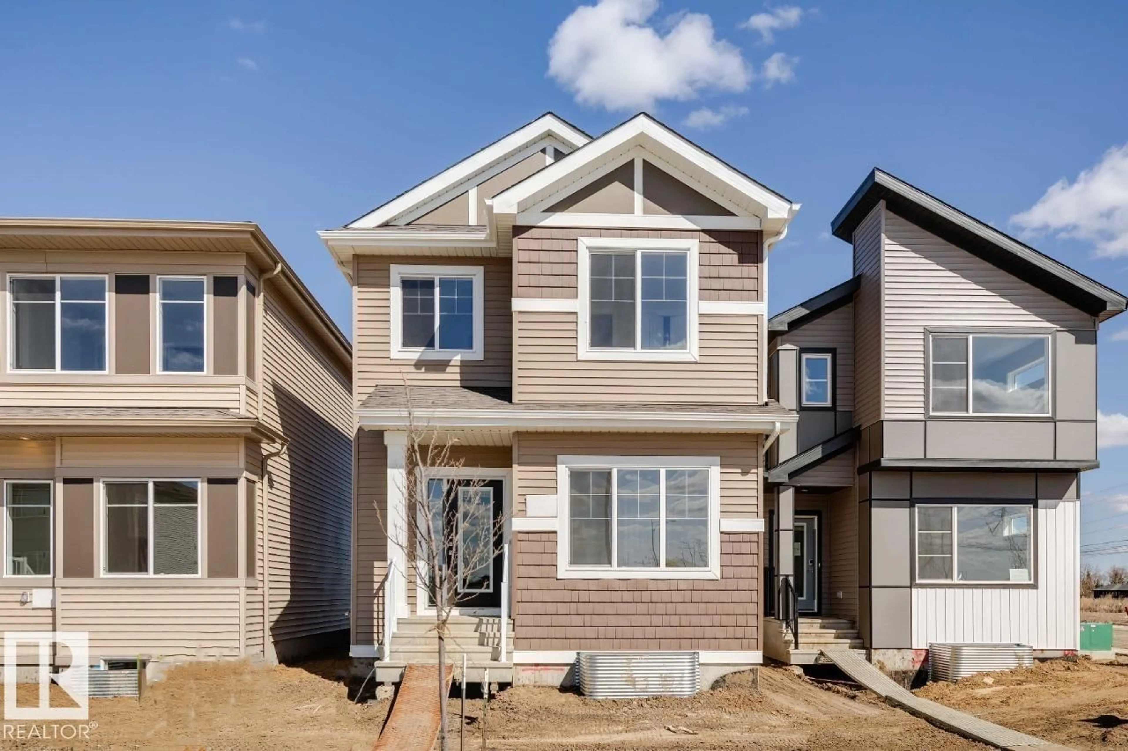 Home with vinyl exterior material, street for 305 EDGEMONT DR, Edmonton Alberta T6M3G7