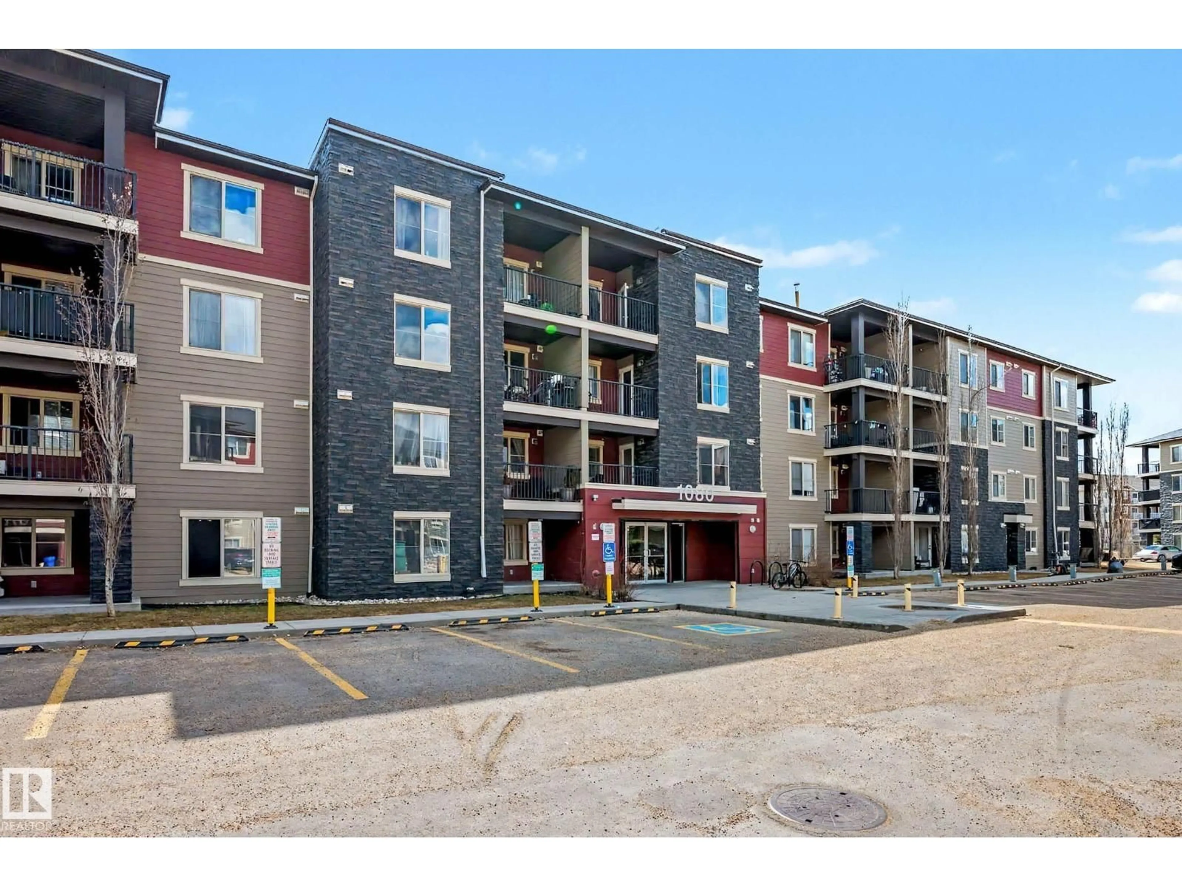 A pic from outside/outdoor area/front of a property/back of a property/a pic from drone, building for #404 - 1080 MCCONACHIE BV, Edmonton Alberta T5Y0K8