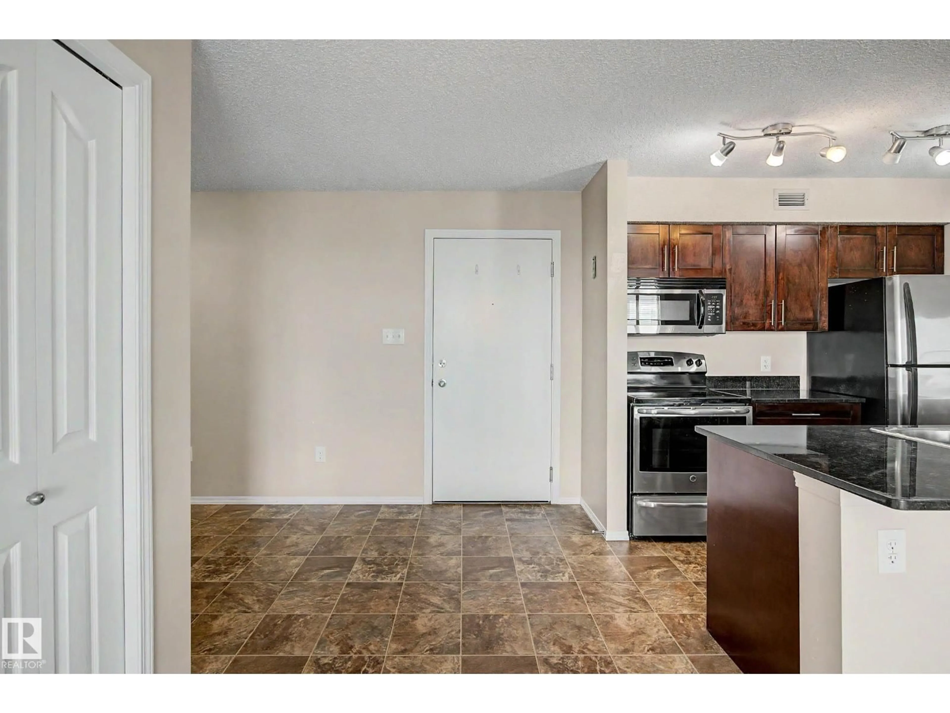 Standard kitchen, ceramic/tile floor for #404 - 1080 MCCONACHIE BV, Edmonton Alberta T5Y0K8