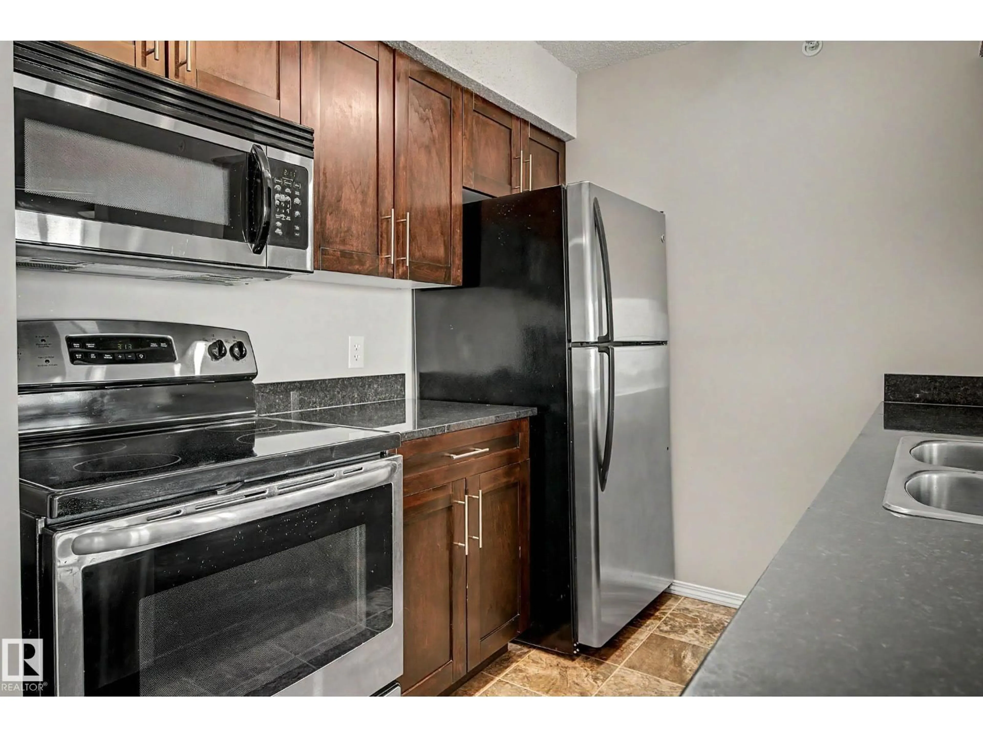 Standard kitchen, unknown for #404 - 1080 MCCONACHIE BV, Edmonton Alberta T5Y0K8
