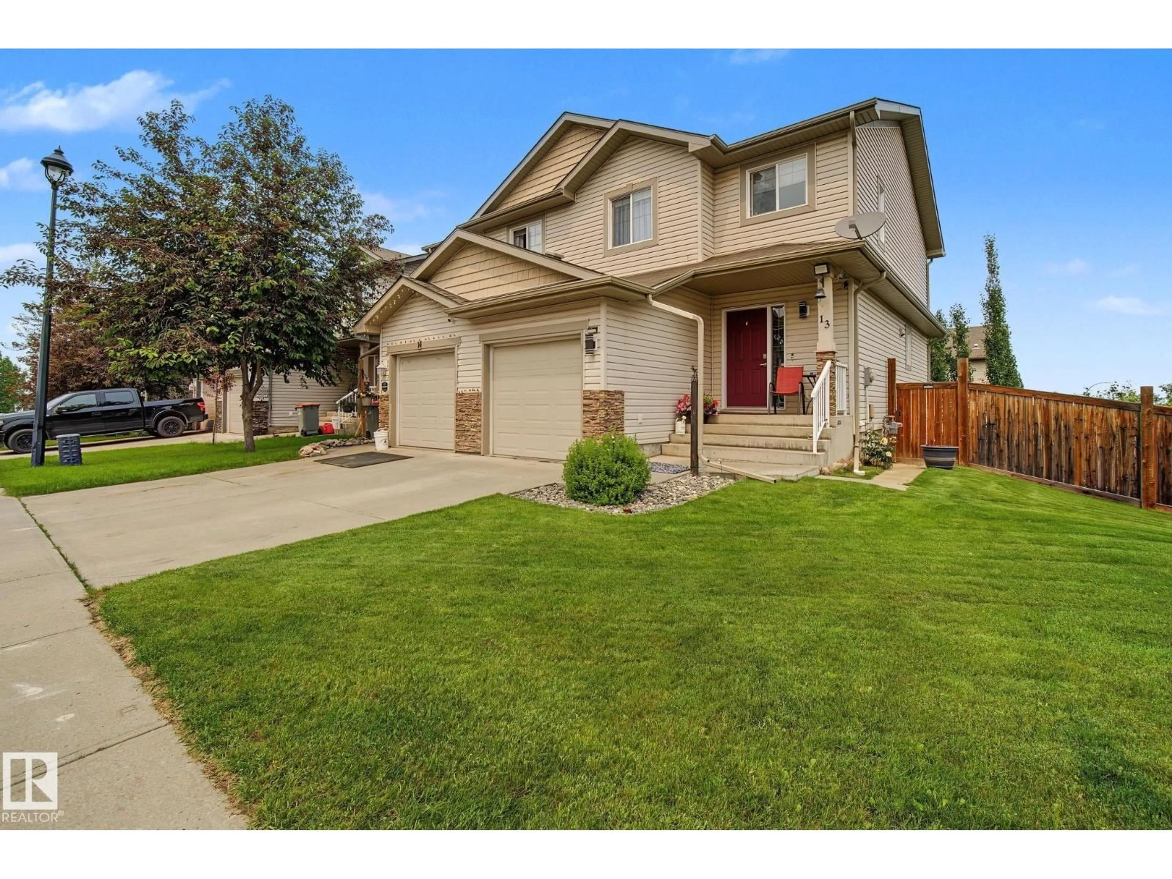 Home with vinyl exterior material, street for 85 - 13 SPRUCE VILLAGE DR, Spruce Grove Alberta T7X0L2