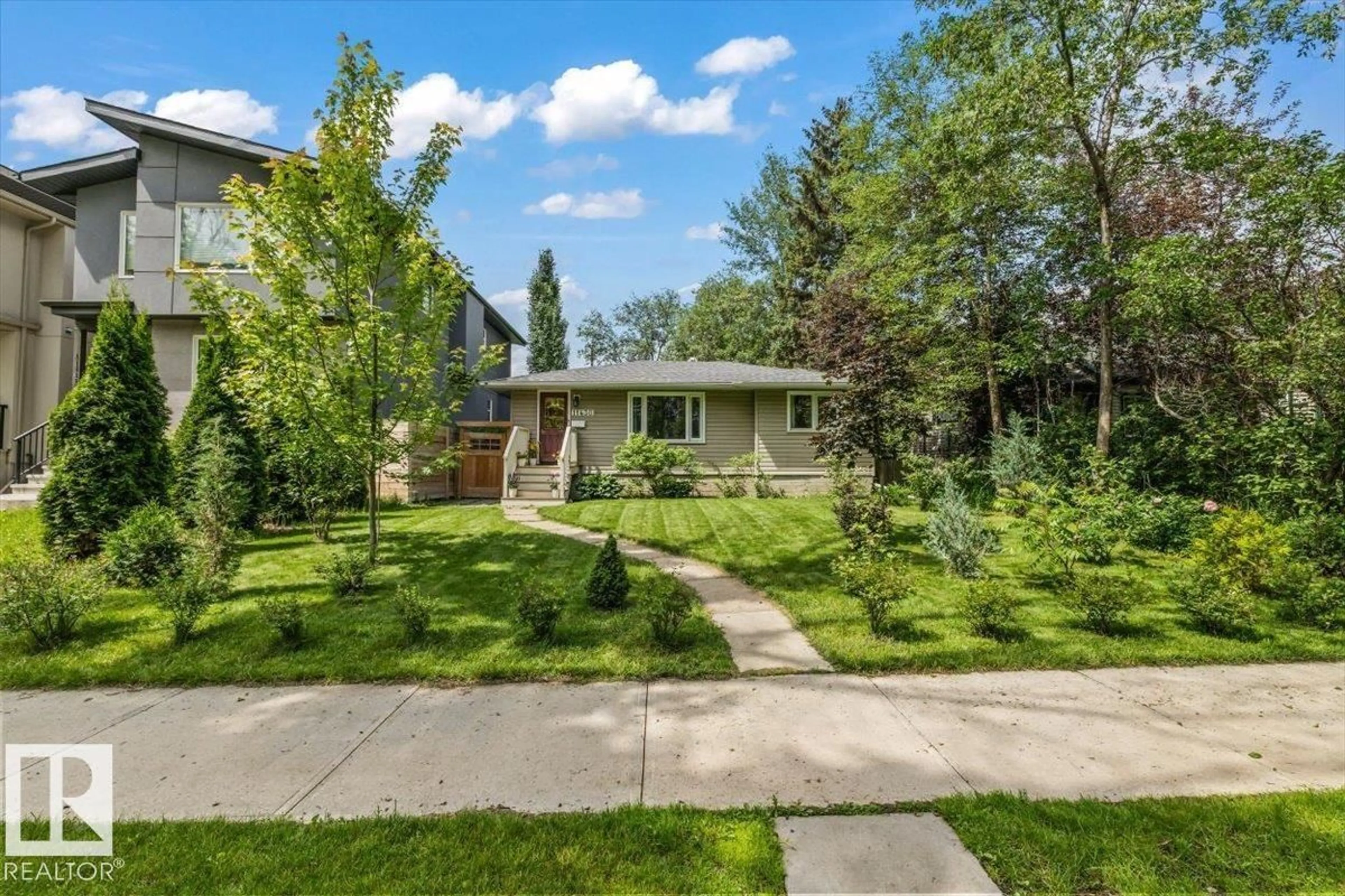 A pic from outside/outdoor area/front of a property/back of a property/a pic from drone, street for 11430 122 ST, Edmonton Alberta T5M0B9
