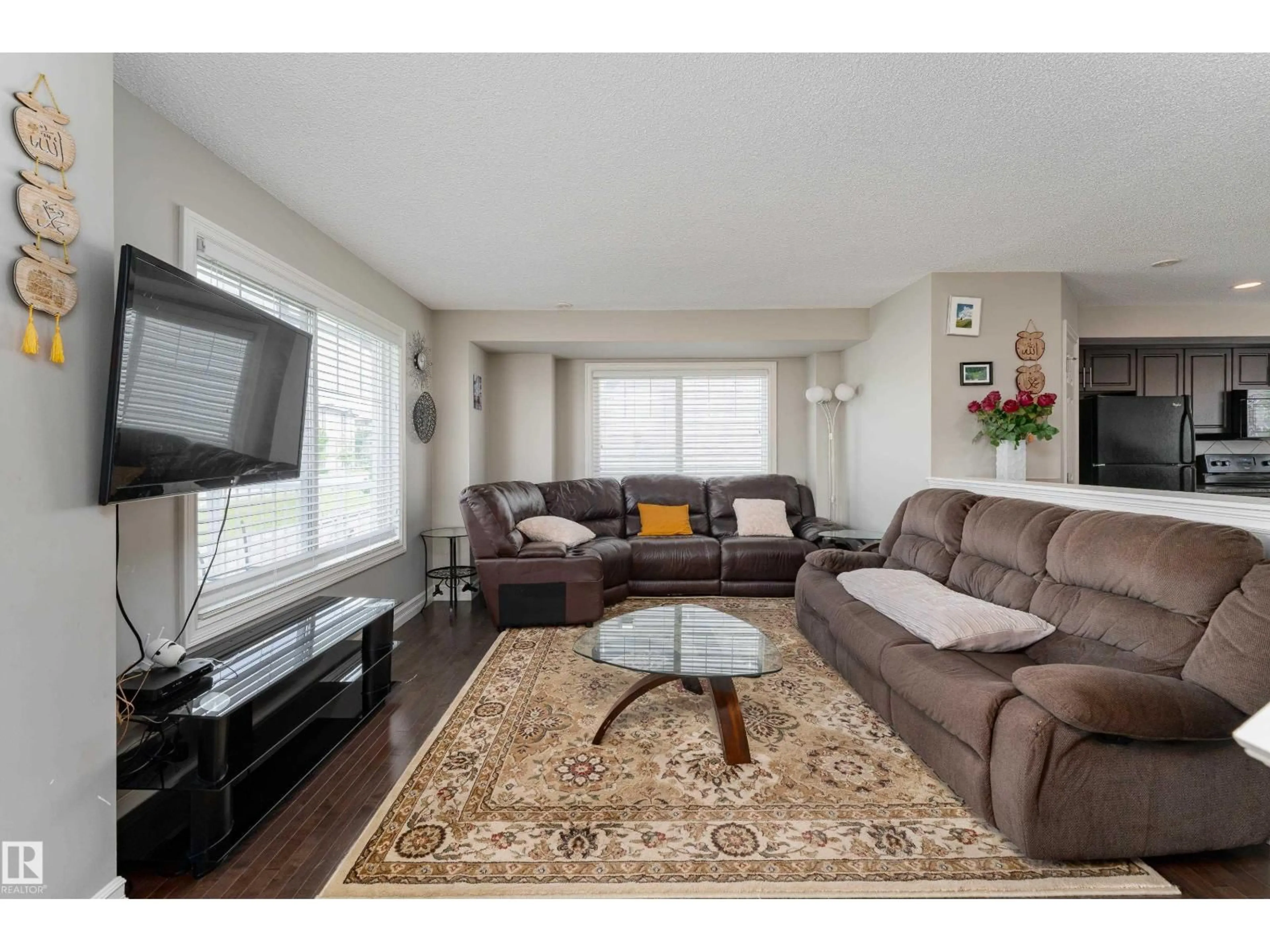 Living room with furniture, wood/laminate floor for #46 - 655 TAMARACK RD, Edmonton Alberta T6T0N4