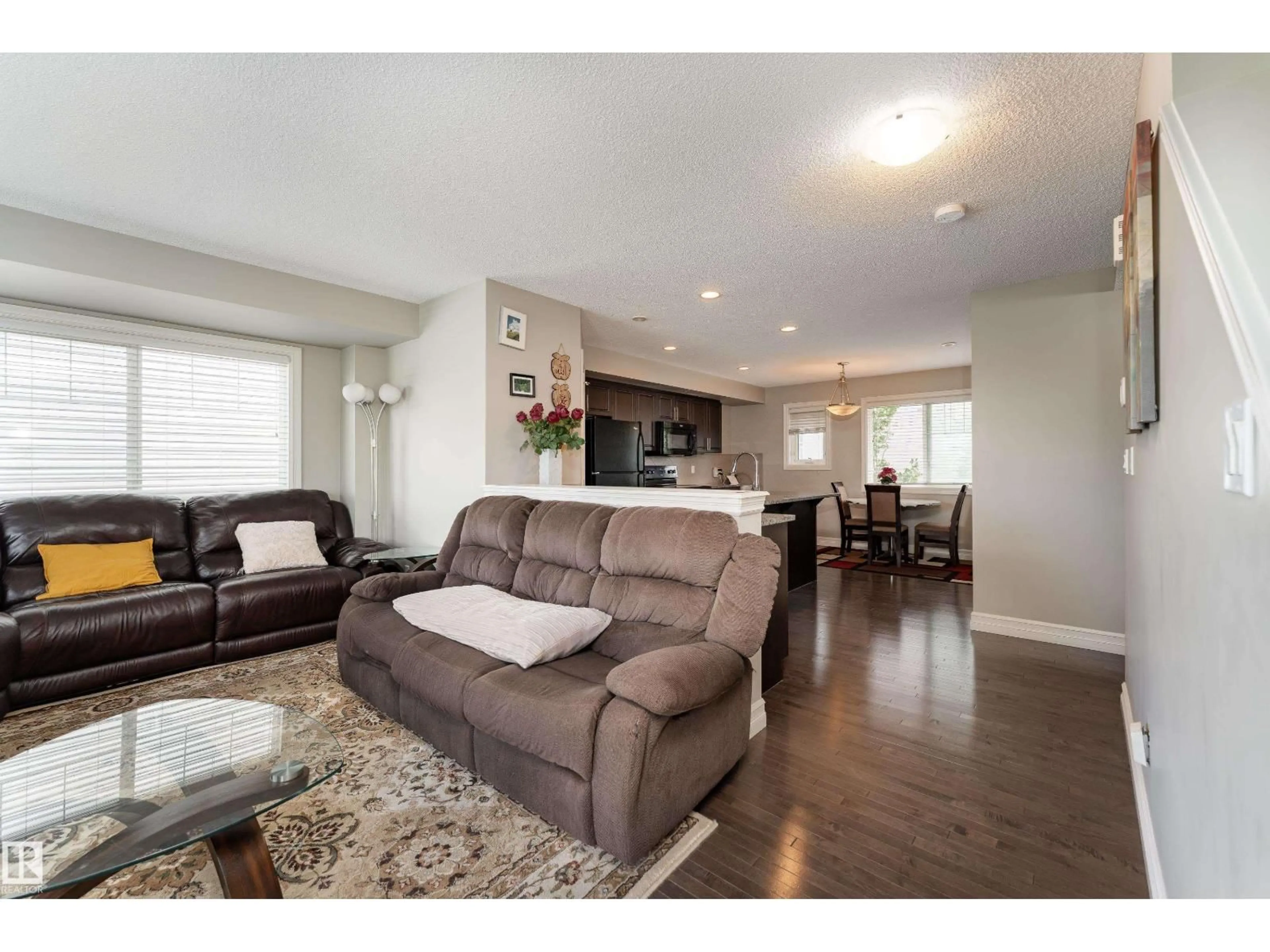 Living room with furniture, wood/laminate floor for #46 - 655 TAMARACK RD, Edmonton Alberta T6T0N4