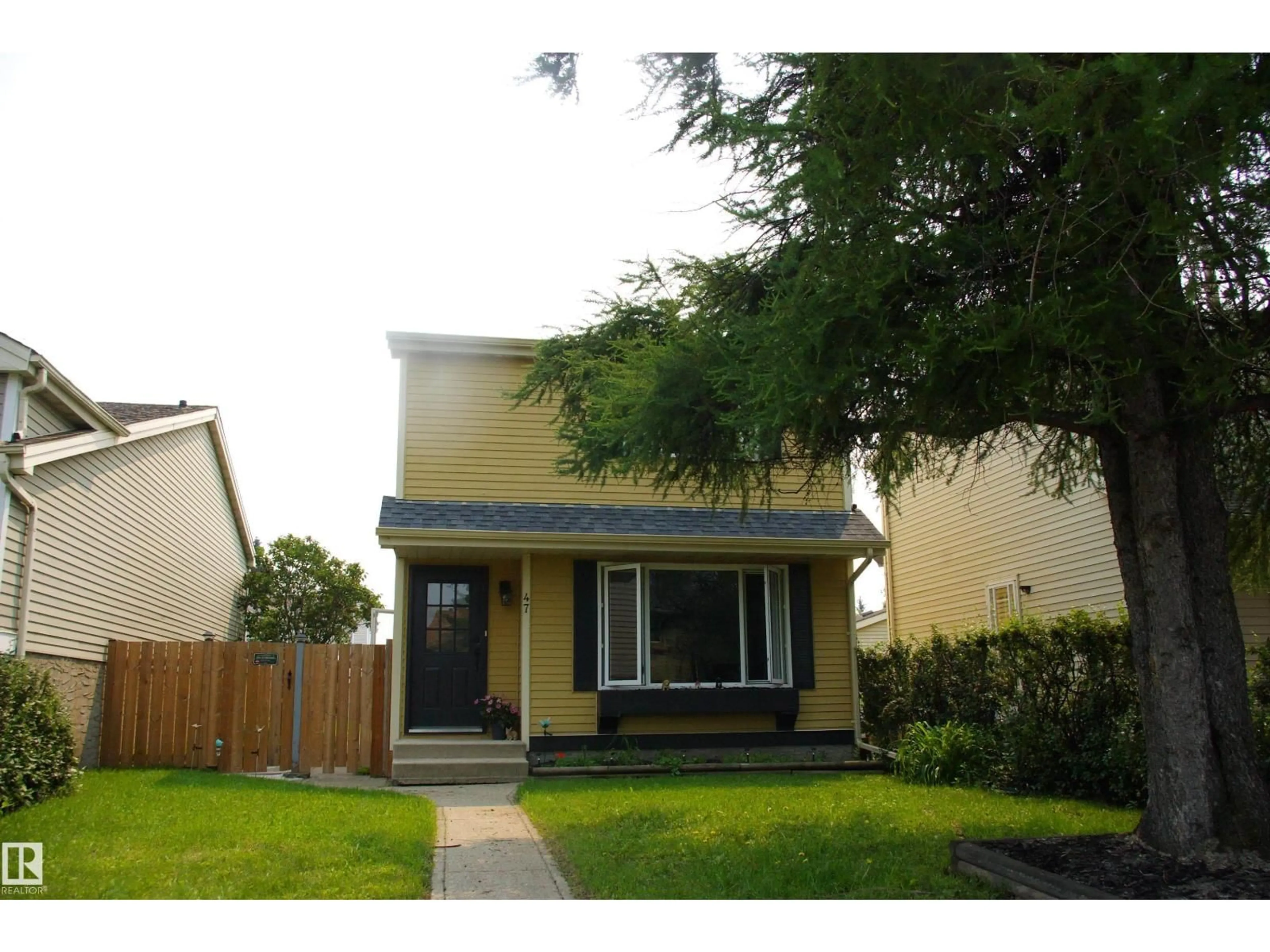 Home with vinyl exterior material, street for 47 BIRCH DR, Gibbons Alberta T0A1N0