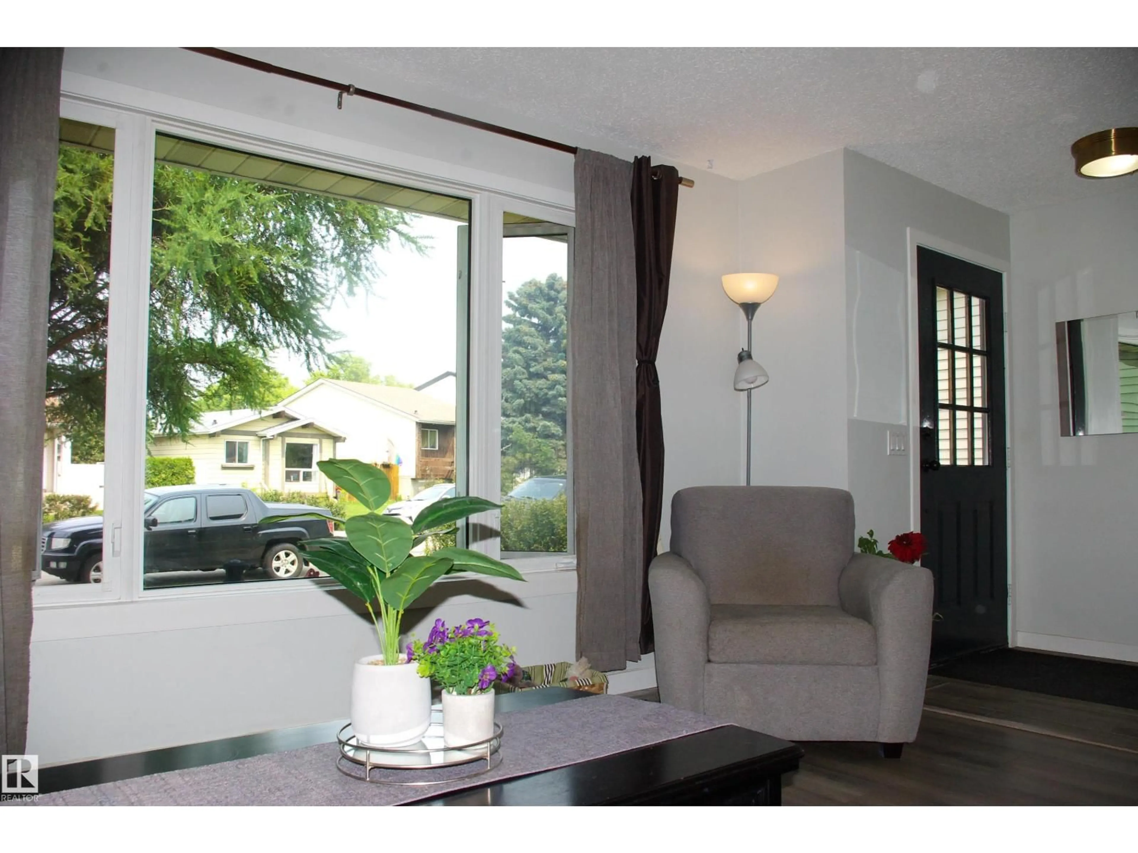 Living room with furniture, wood/laminate floor for 47 BIRCH DR, Gibbons Alberta T0A1N0