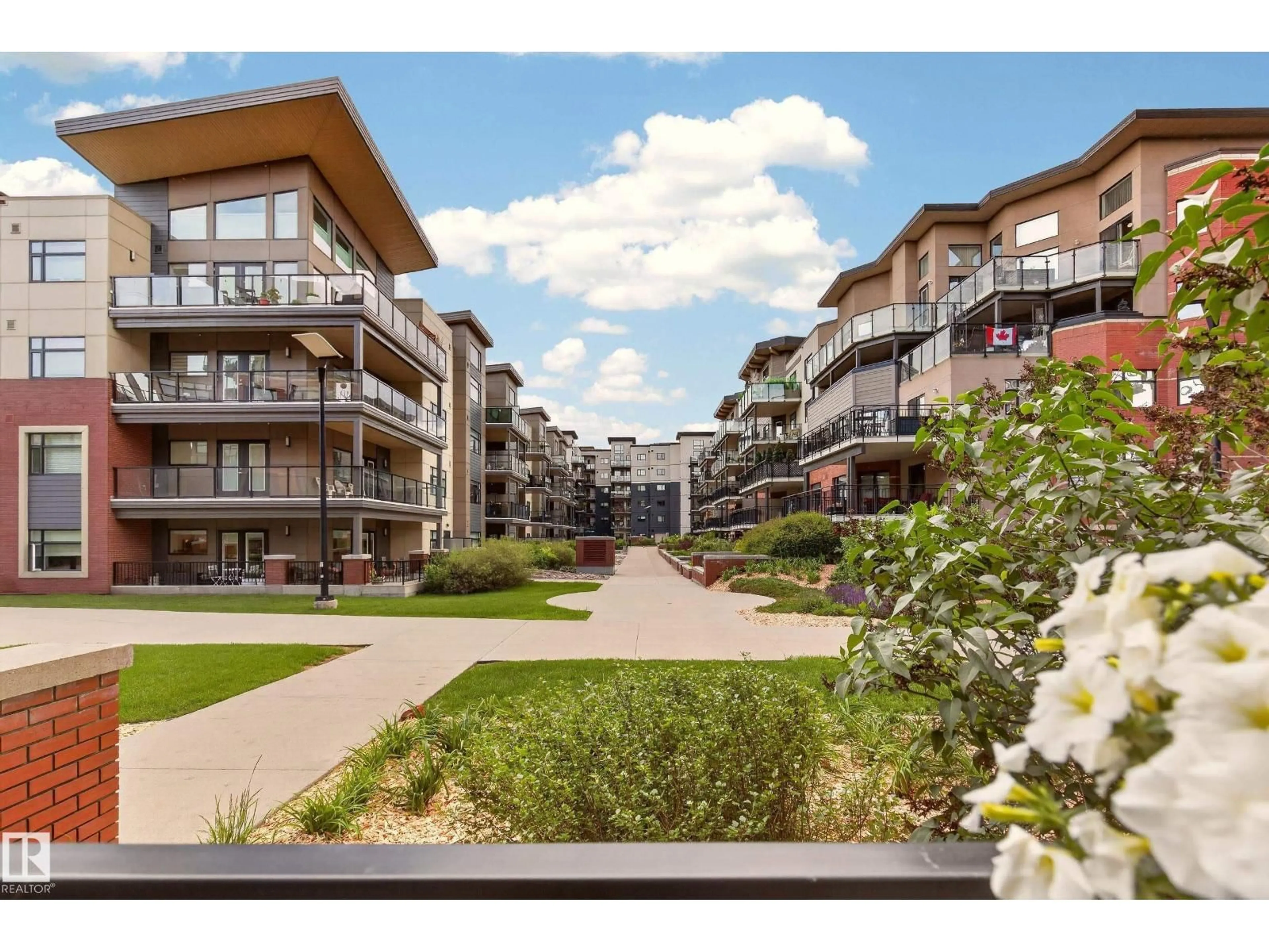 A pic from outside/outdoor area/front of a property/back of a property/a pic from drone, unknown for 141 - 107 FESTIVAL WY, Sherwood Park Alberta T8A3V8