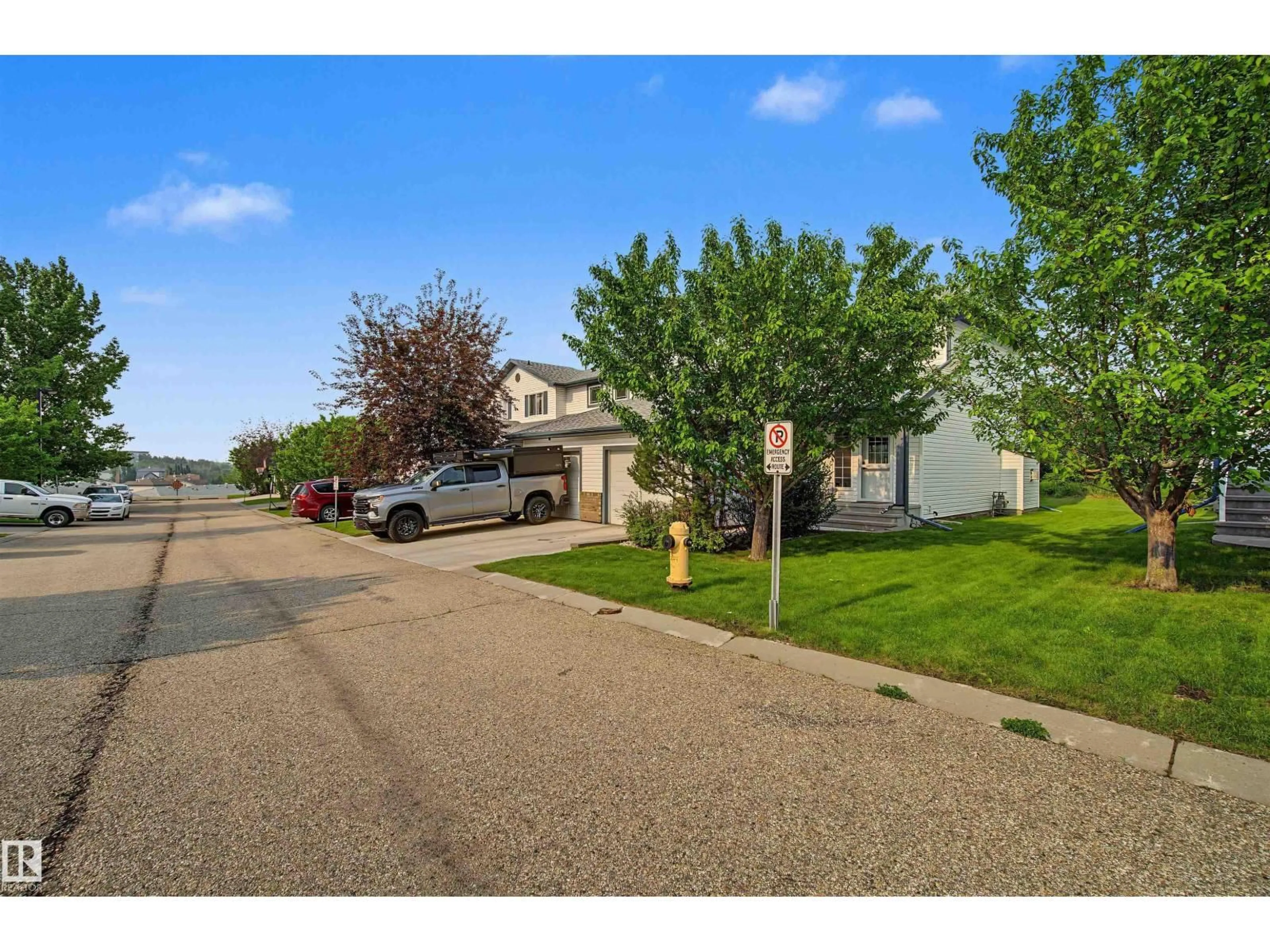 A pic from outside/outdoor area/front of a property/back of a property/a pic from drone, street for 15 - 450 HYNDMAN CR, Edmonton Alberta T5A0E2