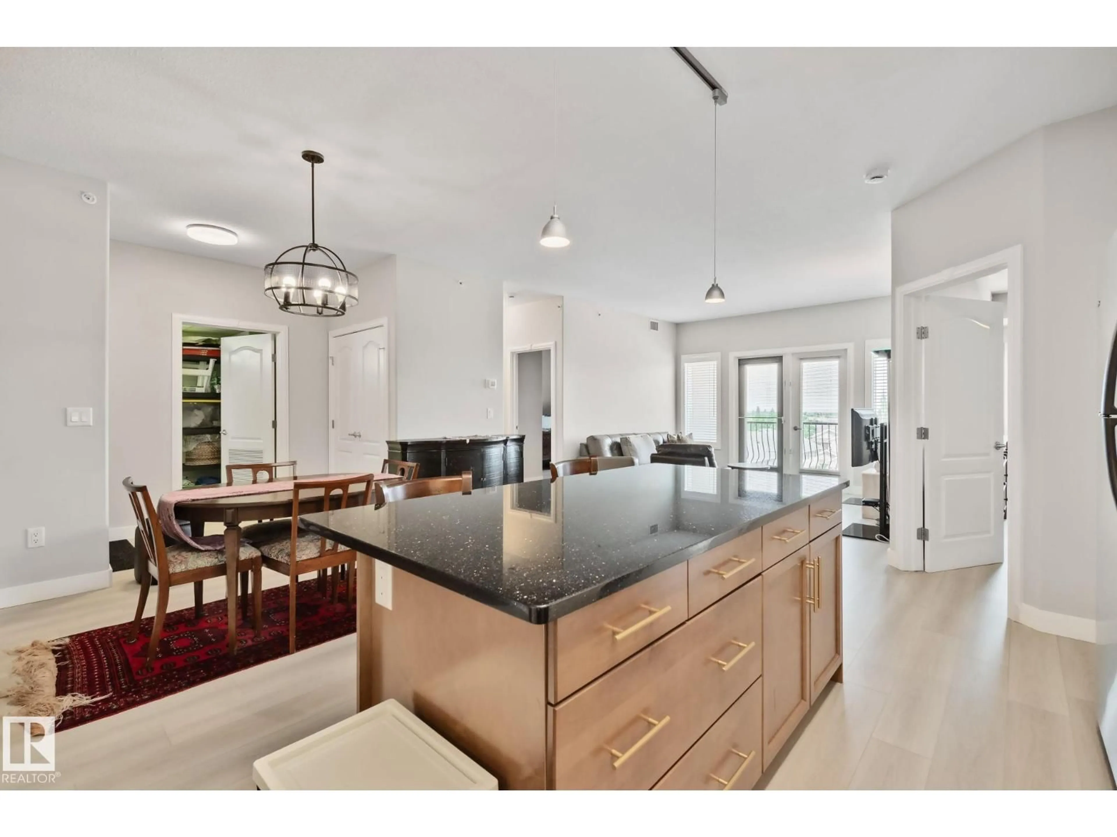 Open concept kitchen, ceramic/tile floor for 432 - 1406 HODGSON WY, Edmonton Alberta T6R3K1