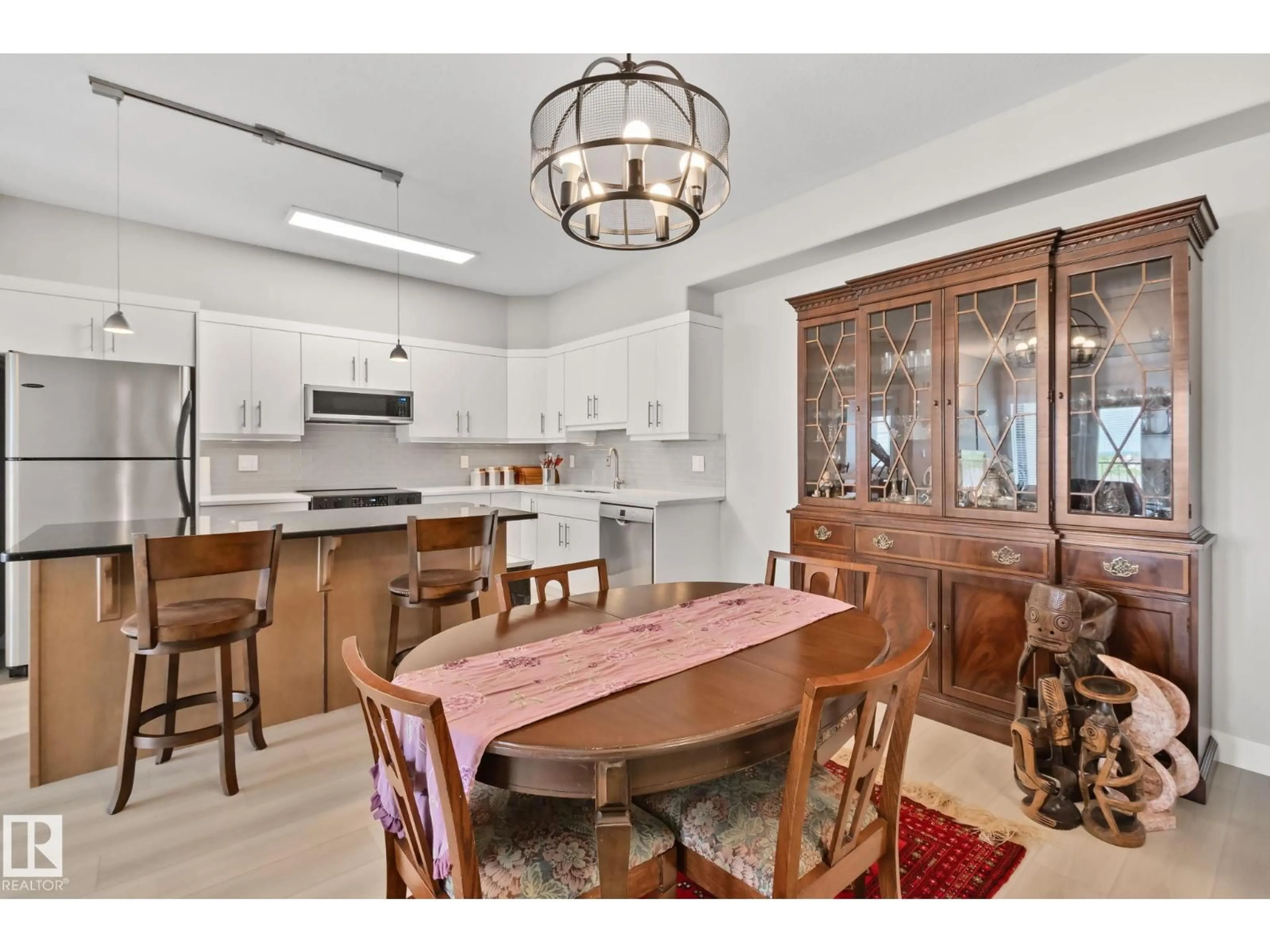 Open concept kitchen, ceramic/tile floor for 432 - 1406 HODGSON WY, Edmonton Alberta T6R3K1