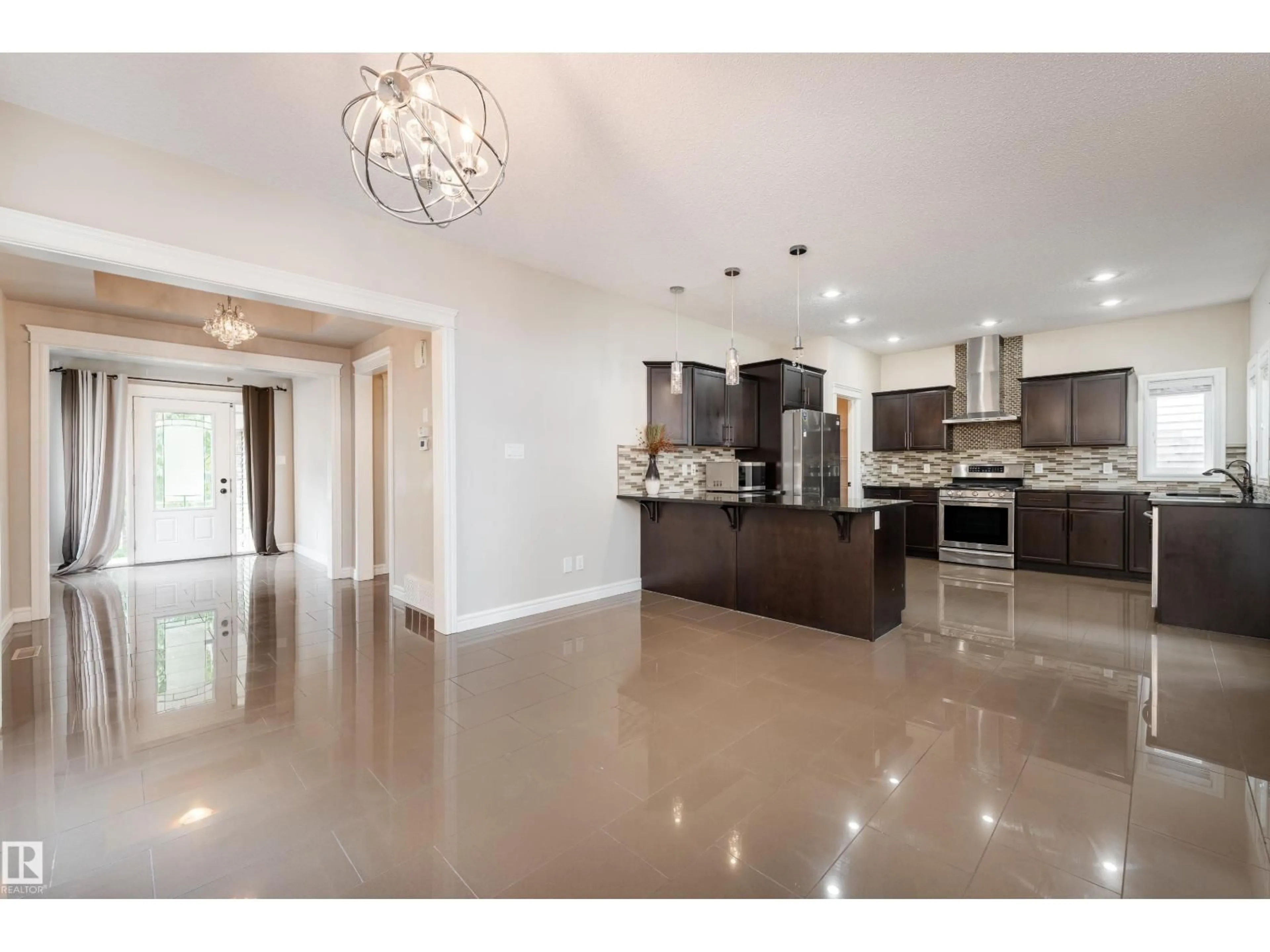 Open concept kitchen, ceramic/tile floor for 7916 18 AV, Edmonton Alberta T6X0Z8