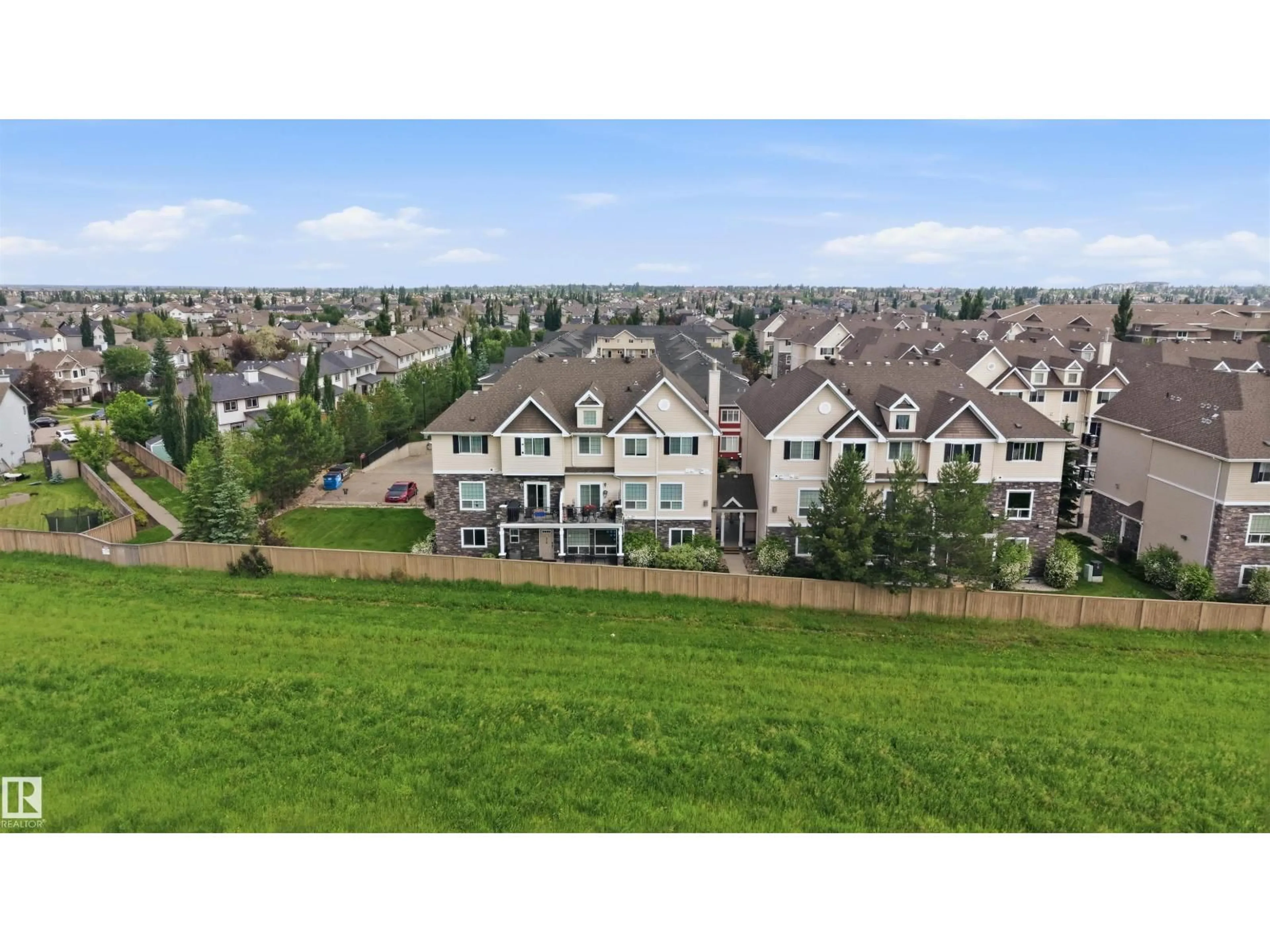 A pic from outside/outdoor area/front of a property/back of a property/a pic from drone, mountain view for 7293 - 117 SOUTH TERWILLEGAR DR, Edmonton Alberta T6R0N5