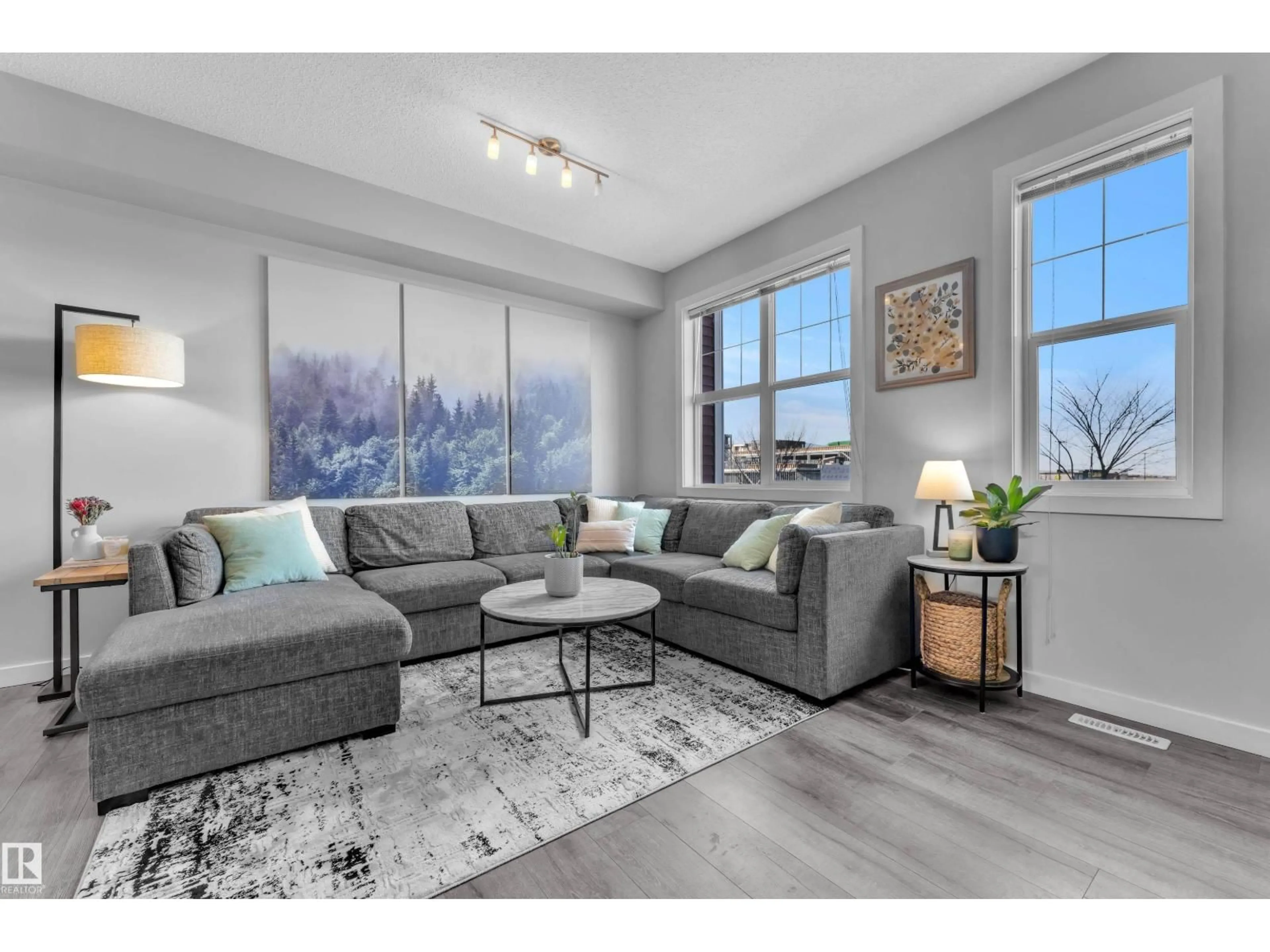Living room with furniture, unknown for 15 - 2803 JAMES MOWATT TR, Edmonton Alberta T6W2P5