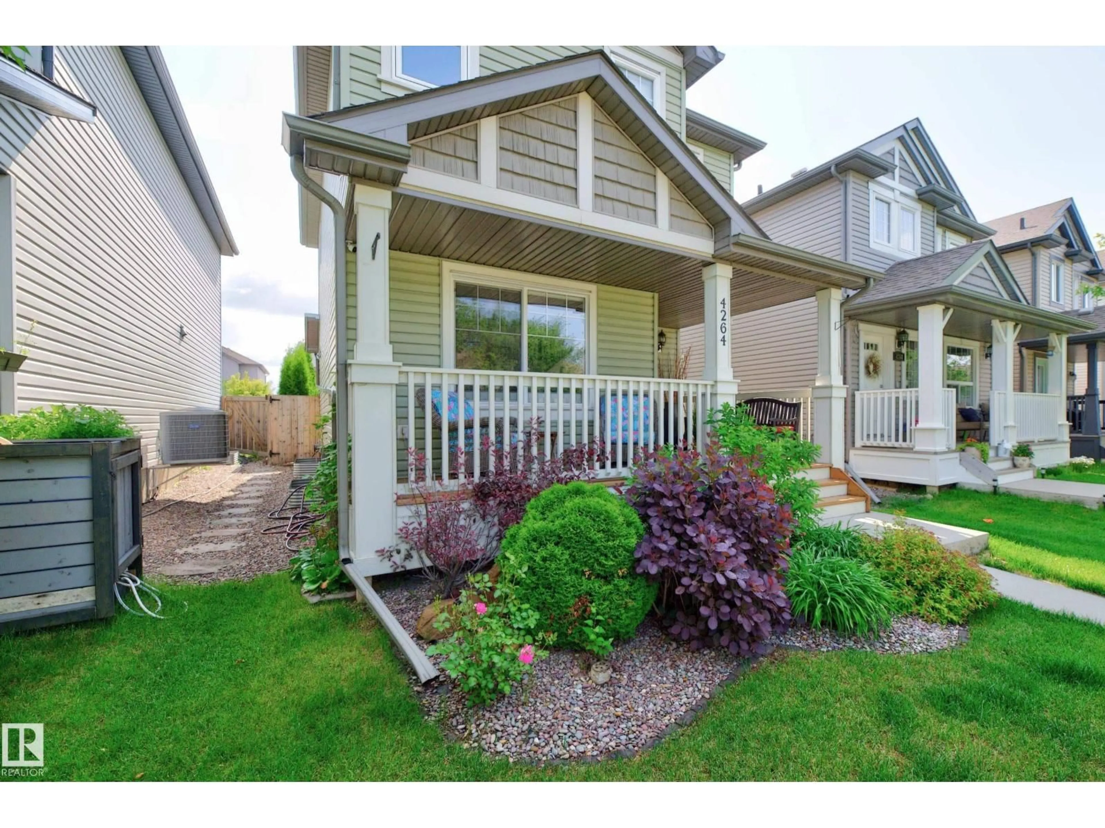 Home with vinyl exterior material, street for 4264 SUMMERLAND DR, Sherwood Park Alberta T8H0R2