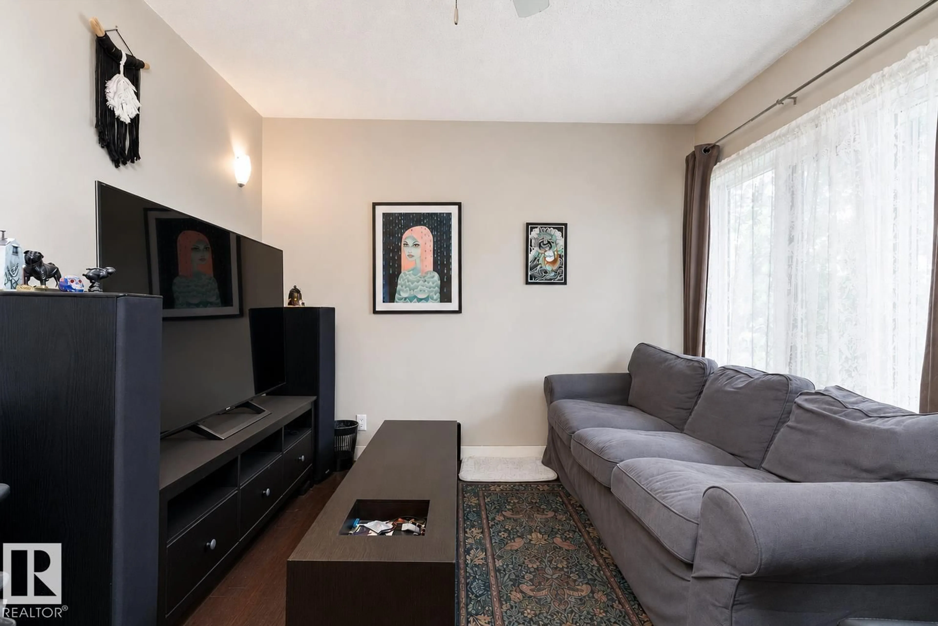 Living room with furniture, unknown for 9631 78 AV, Edmonton Alberta T6C0P2