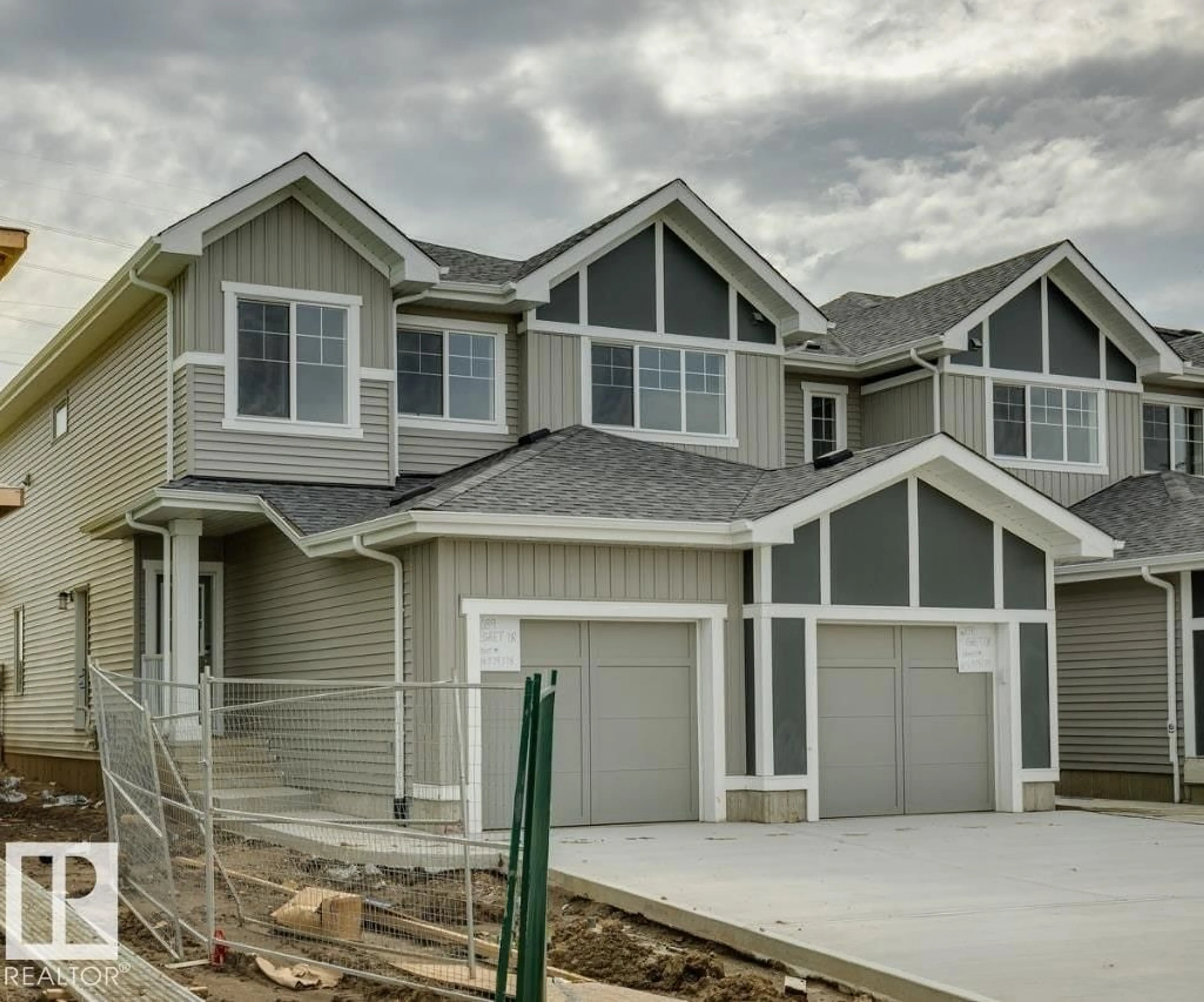 Home with vinyl exterior material, street for 2089 EGRET DR, Edmonton Alberta T6M3G7