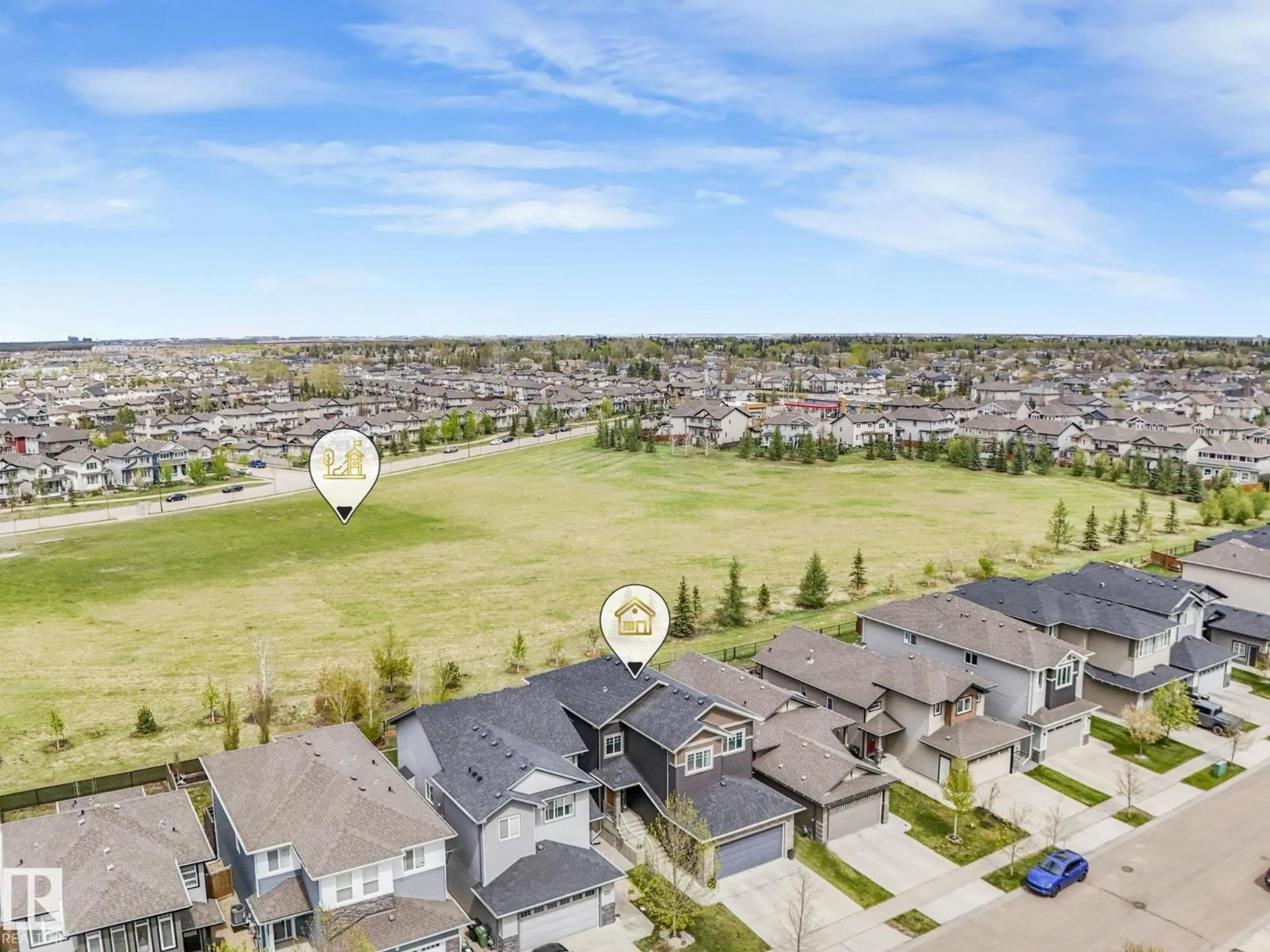 A pic from outside/outdoor area/front of a property/back of a property/a pic from drone, mountain view for 12 SANDALWOOD PL, Leduc Alberta T9E1C2