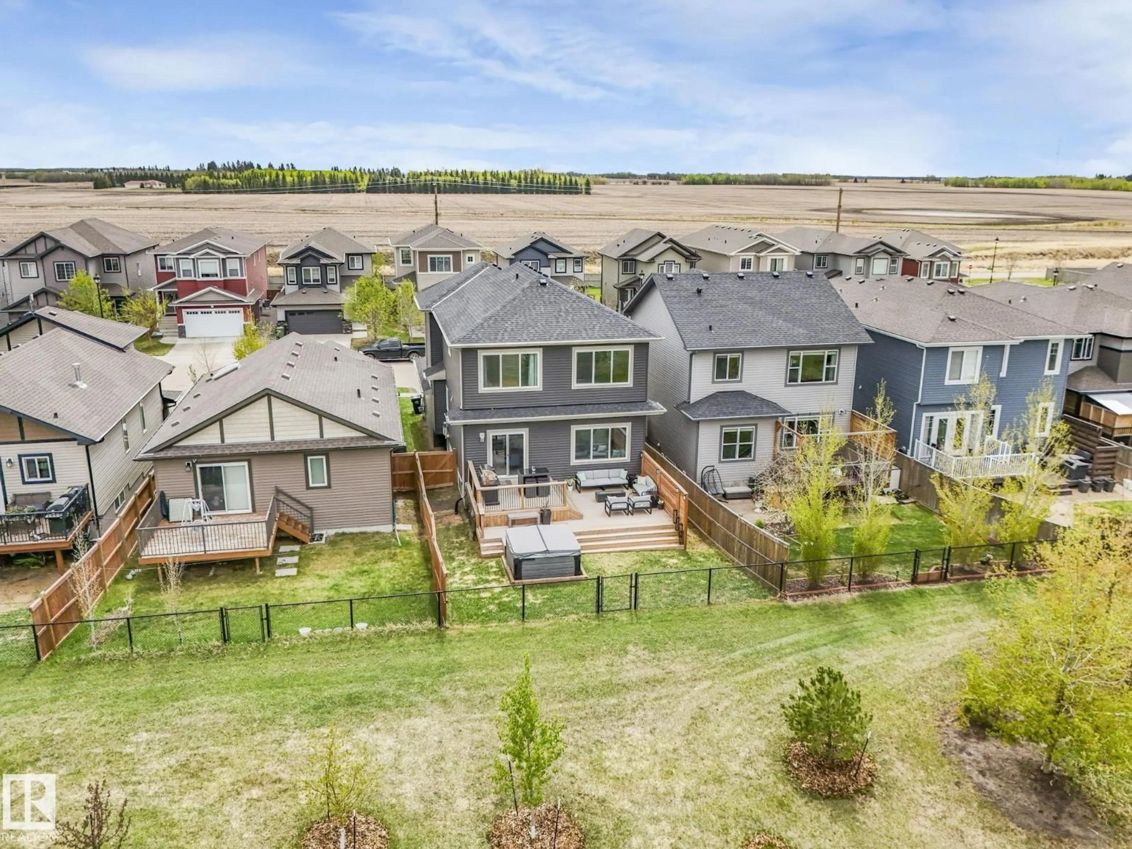 A pic from outside/outdoor area/front of a property/back of a property/a pic from drone, mountain view for 12 SANDALWOOD PL, Leduc Alberta T9E1C2