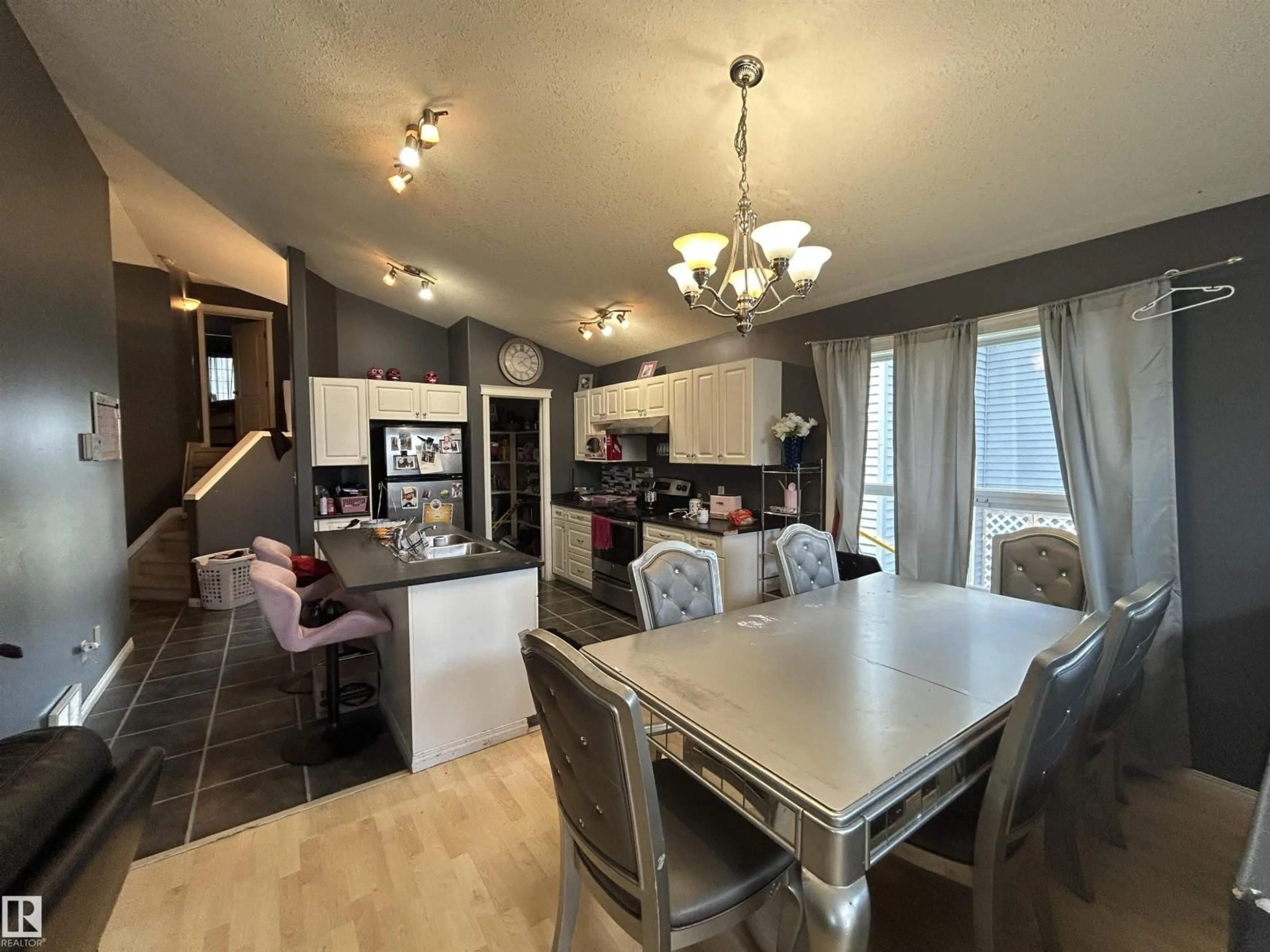 Open concept kitchen, wood/laminate floor for 17 WILLOWBY CL, Stony Plain Alberta T7Z2W6