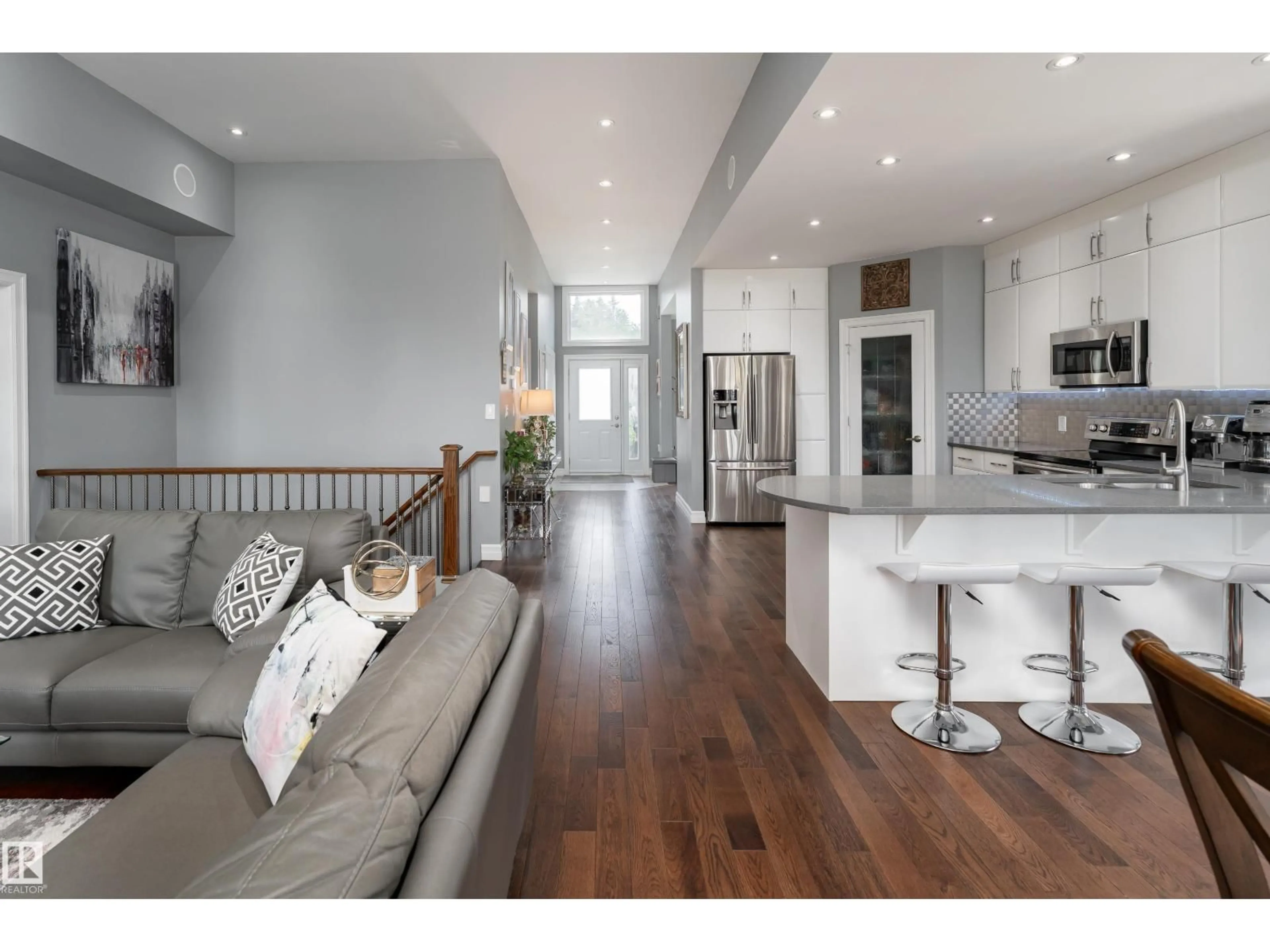 Open concept kitchen, wood/laminate floor for 19B SPRUCE MEADOW LANE, Bon Accord Alberta T0A0K0