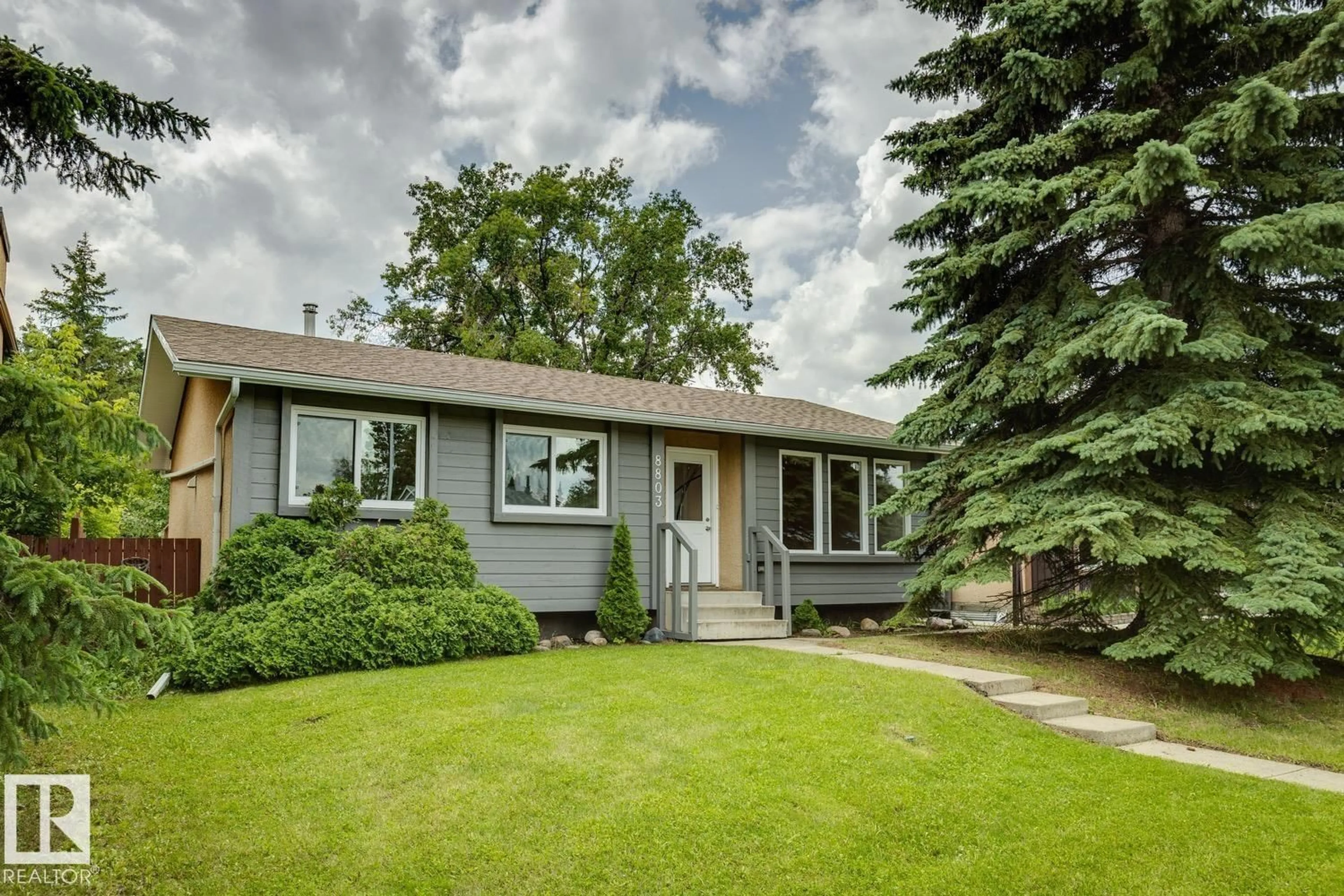 Home with vinyl exterior material, street for 8803 25A AV, Edmonton Alberta T6K2W6