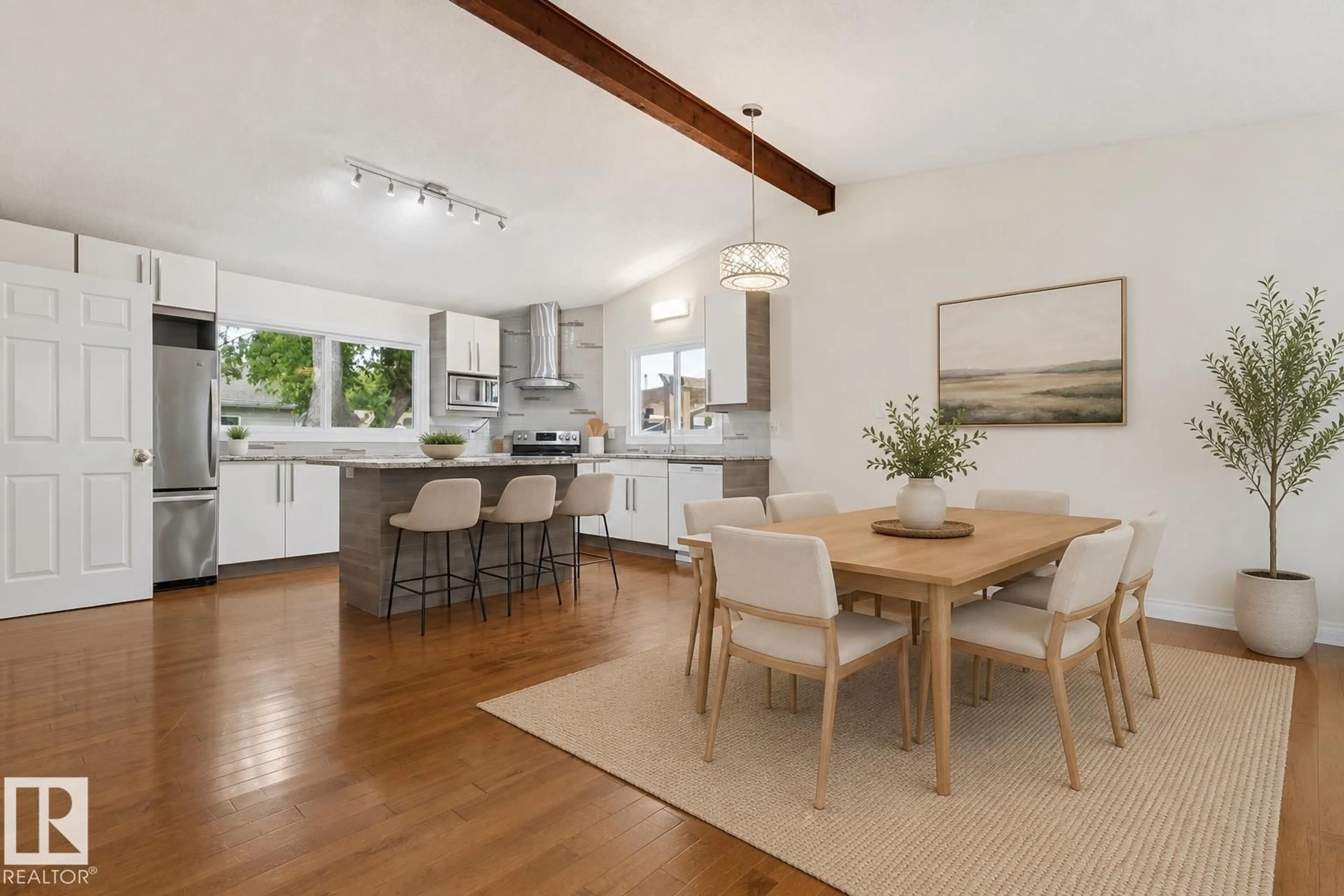 Open concept kitchen, wood/laminate floor for 8803 25A AV, Edmonton Alberta T6K2W6
