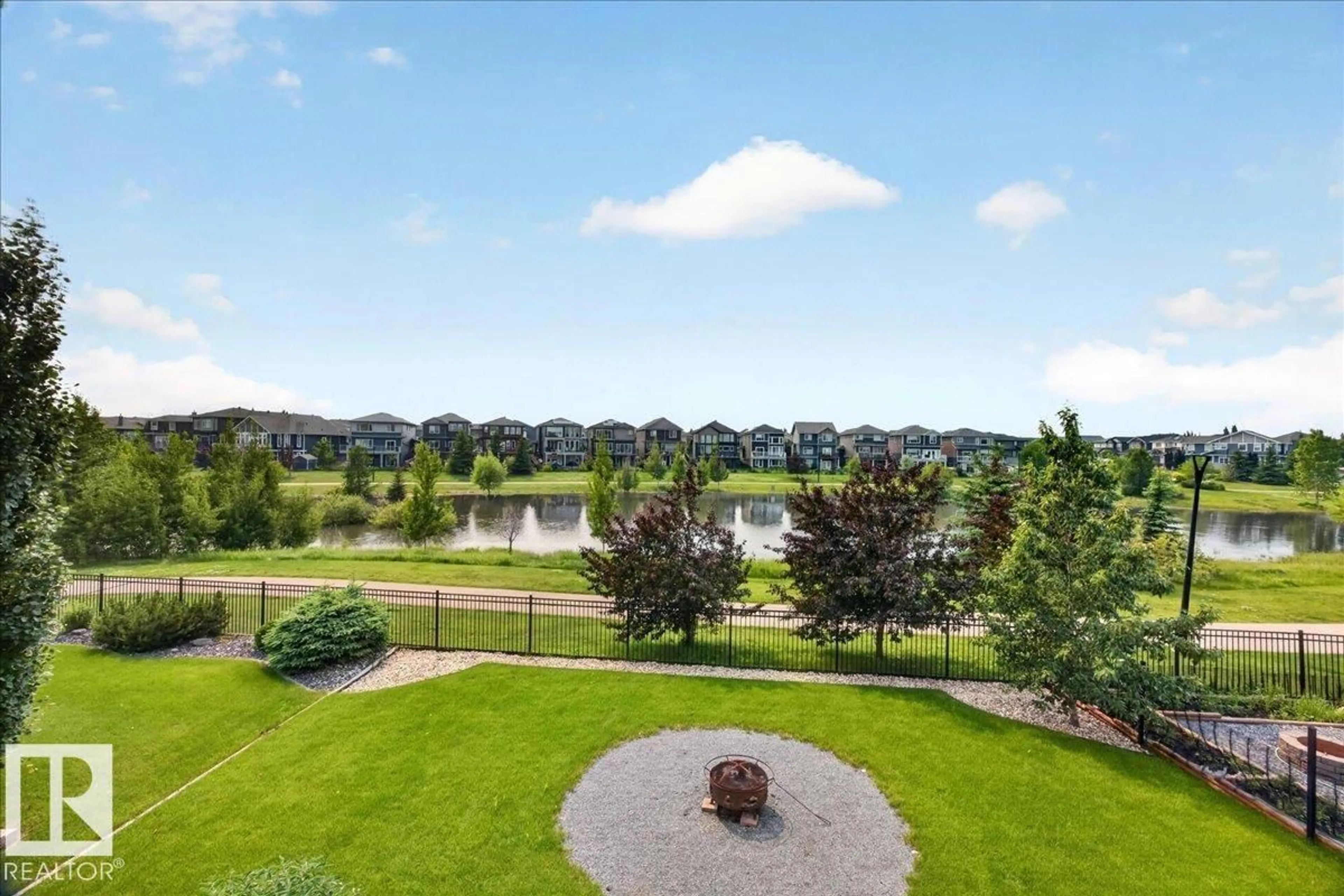 A pic from outside/outdoor area/front of a property/back of a property/a pic from drone, water/lake/river/ocean view for NW - 8508 218 ST, Edmonton Alberta T5T4R9