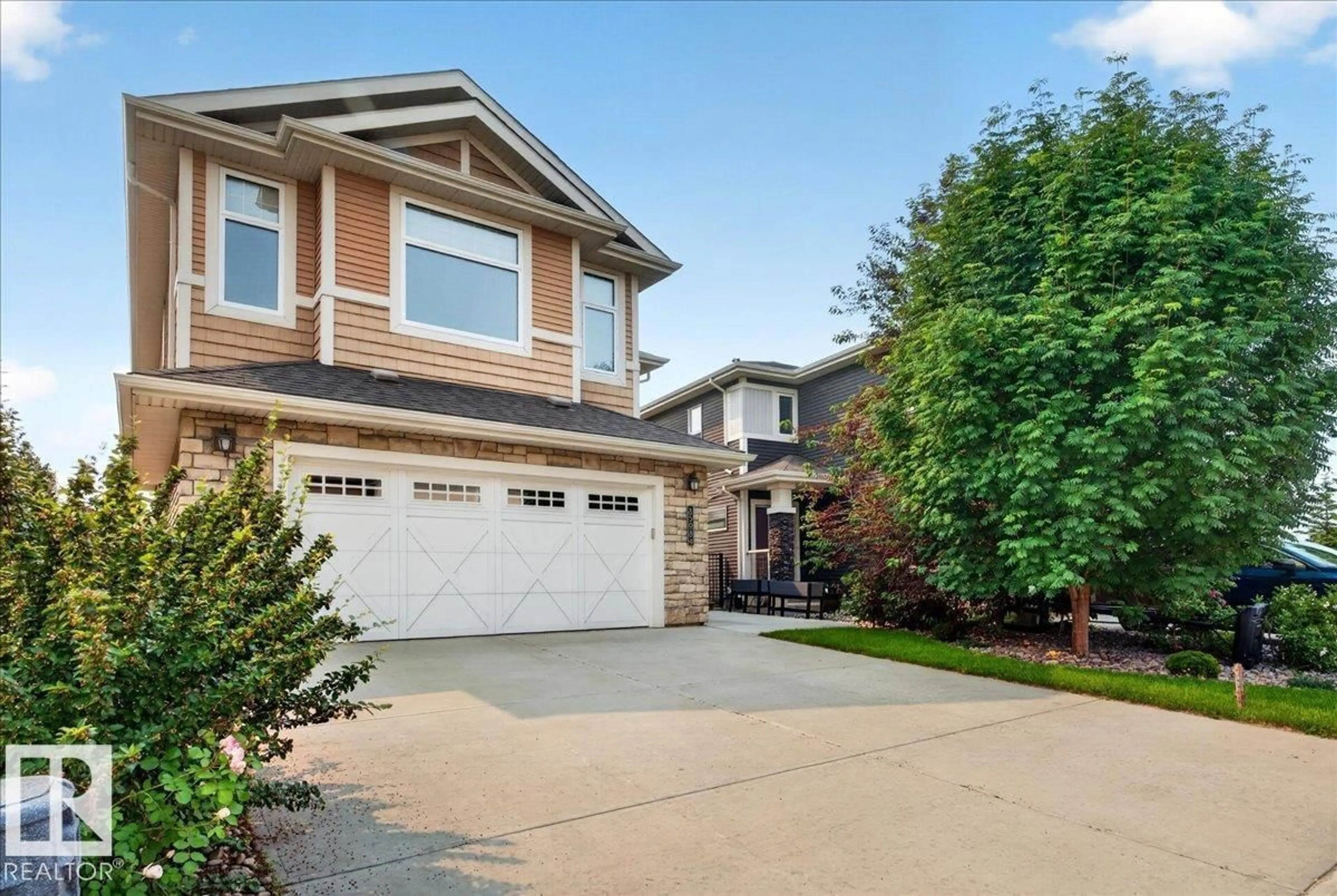 Home with vinyl exterior material, street for NW - 8508 218 ST, Edmonton Alberta T5T4R9